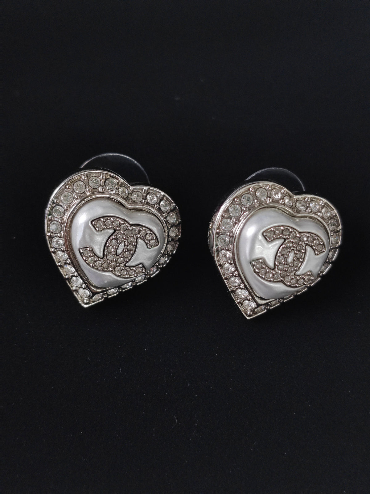 Chanel - Other - Silver-tone metal with clear rhinestone accents and a white heart-shaped inlay; exact composition unknown. - Silver