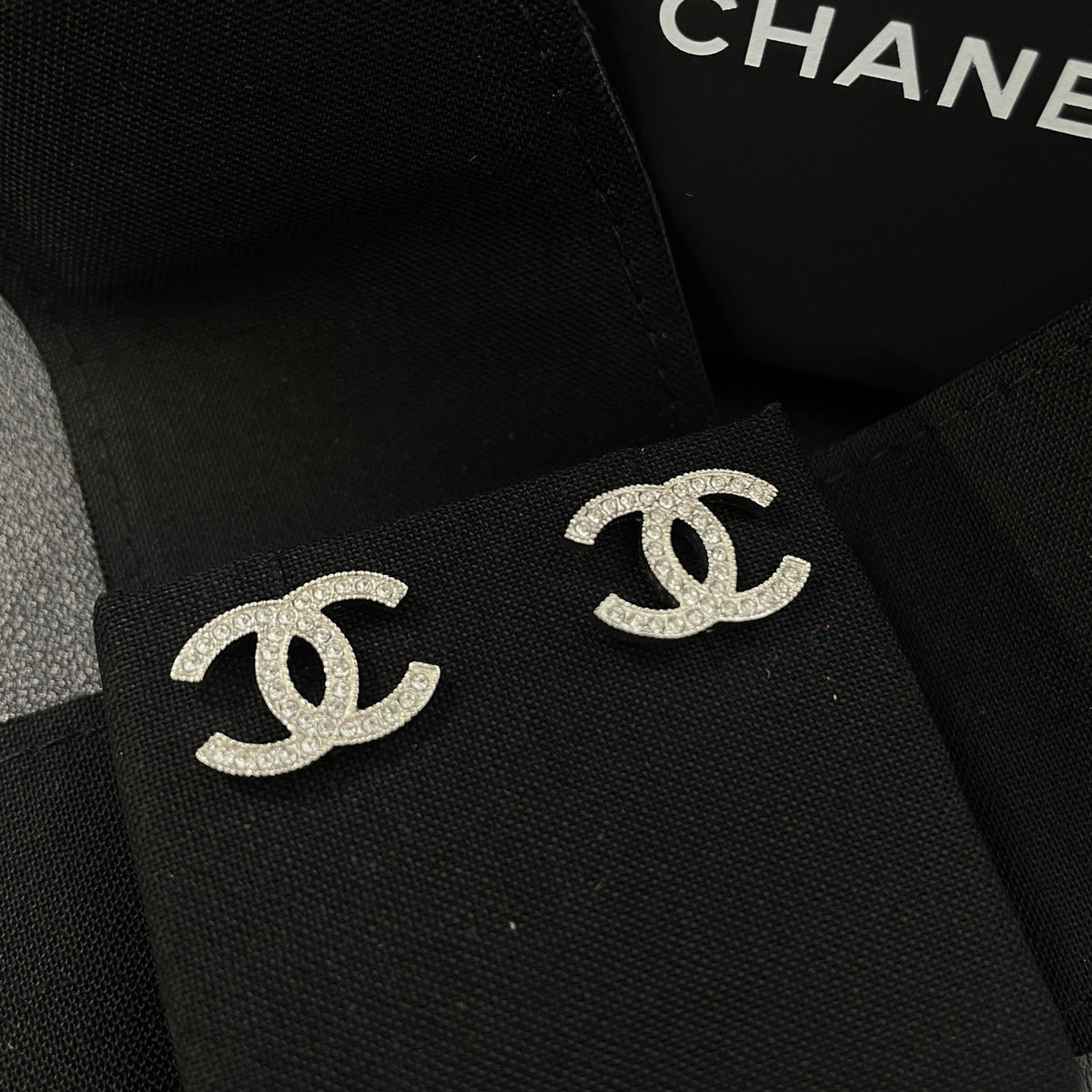 Chanel - Other - Silver-tone metal with clear rhinestone embellishments; exact alloy unspecified. - Silver