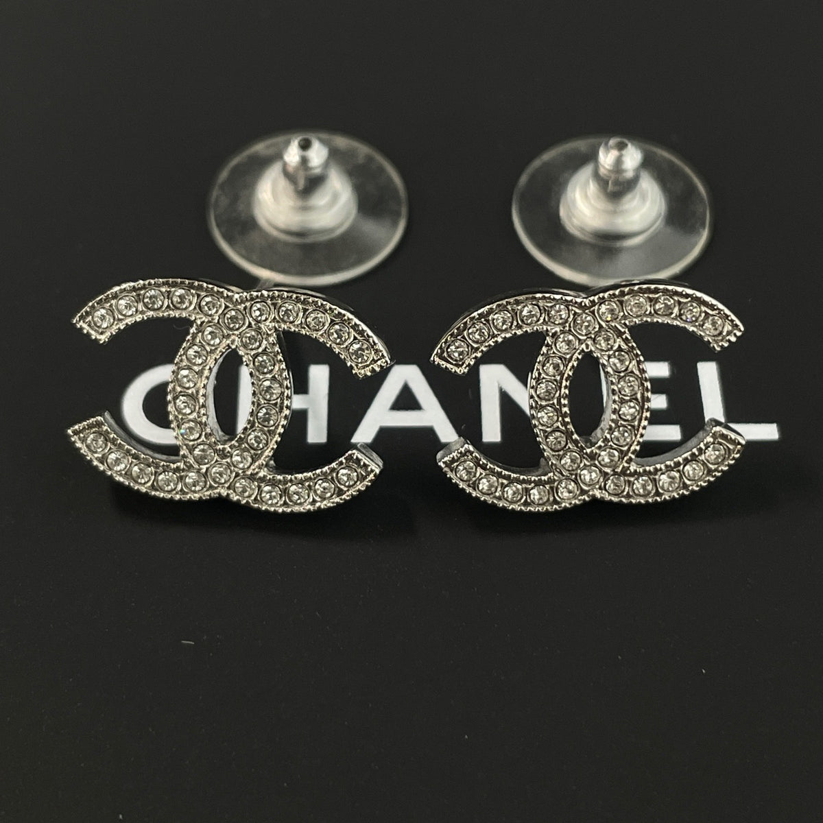 Chanel - Other - Silver-tone metal with clear rhinestone embellishments; exact alloy unspecified. - Silver