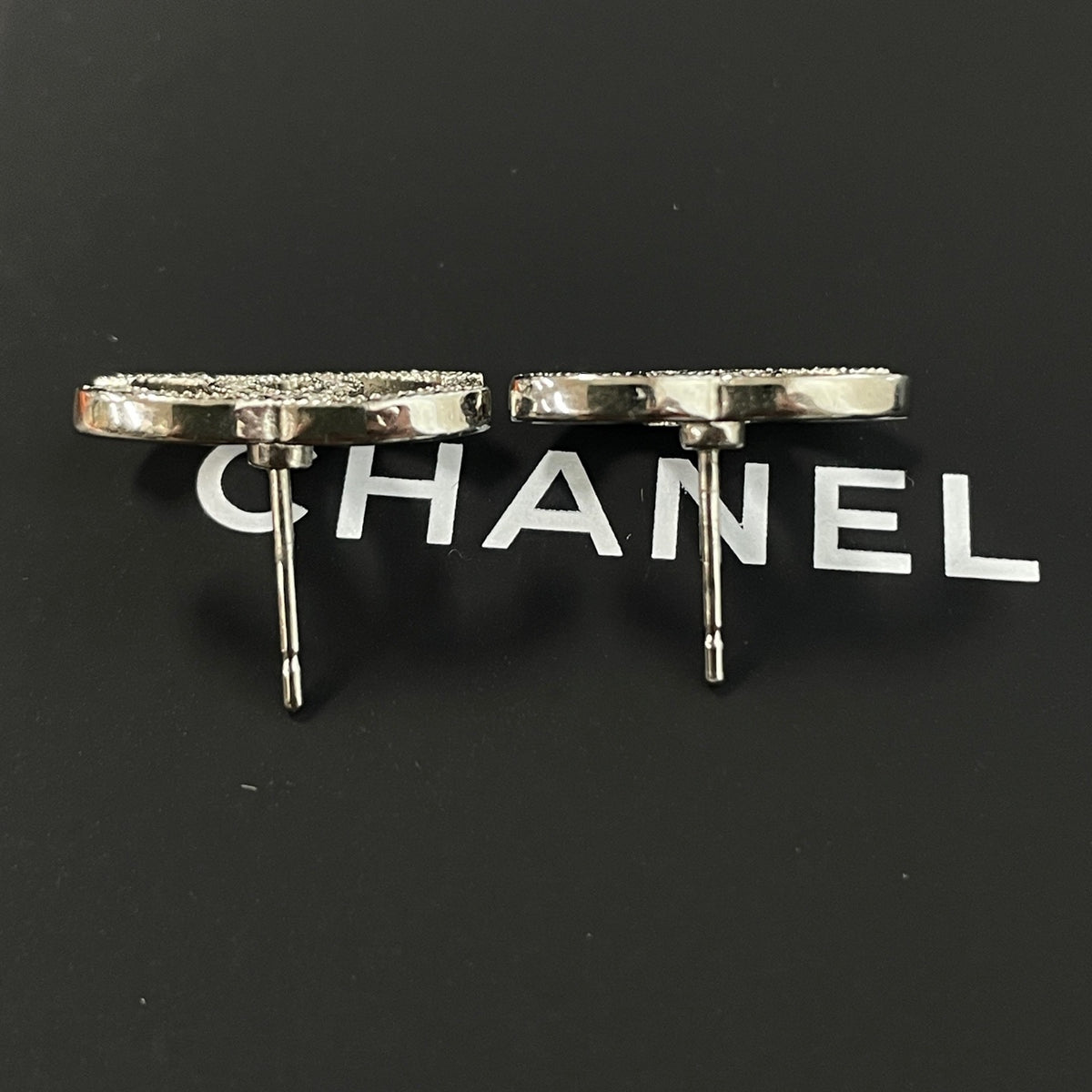 Chanel - Other - Silver-tone metal with clear rhinestone embellishments; exact alloy unspecified. - Silver