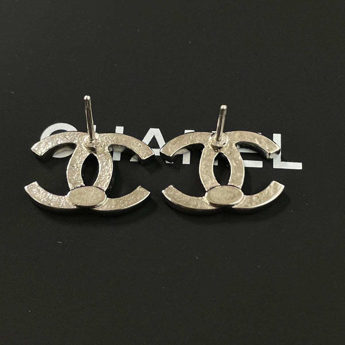 Chanel - Other - Silver-tone metal with clear rhinestone embellishments; exact alloy unspecified. - Silver