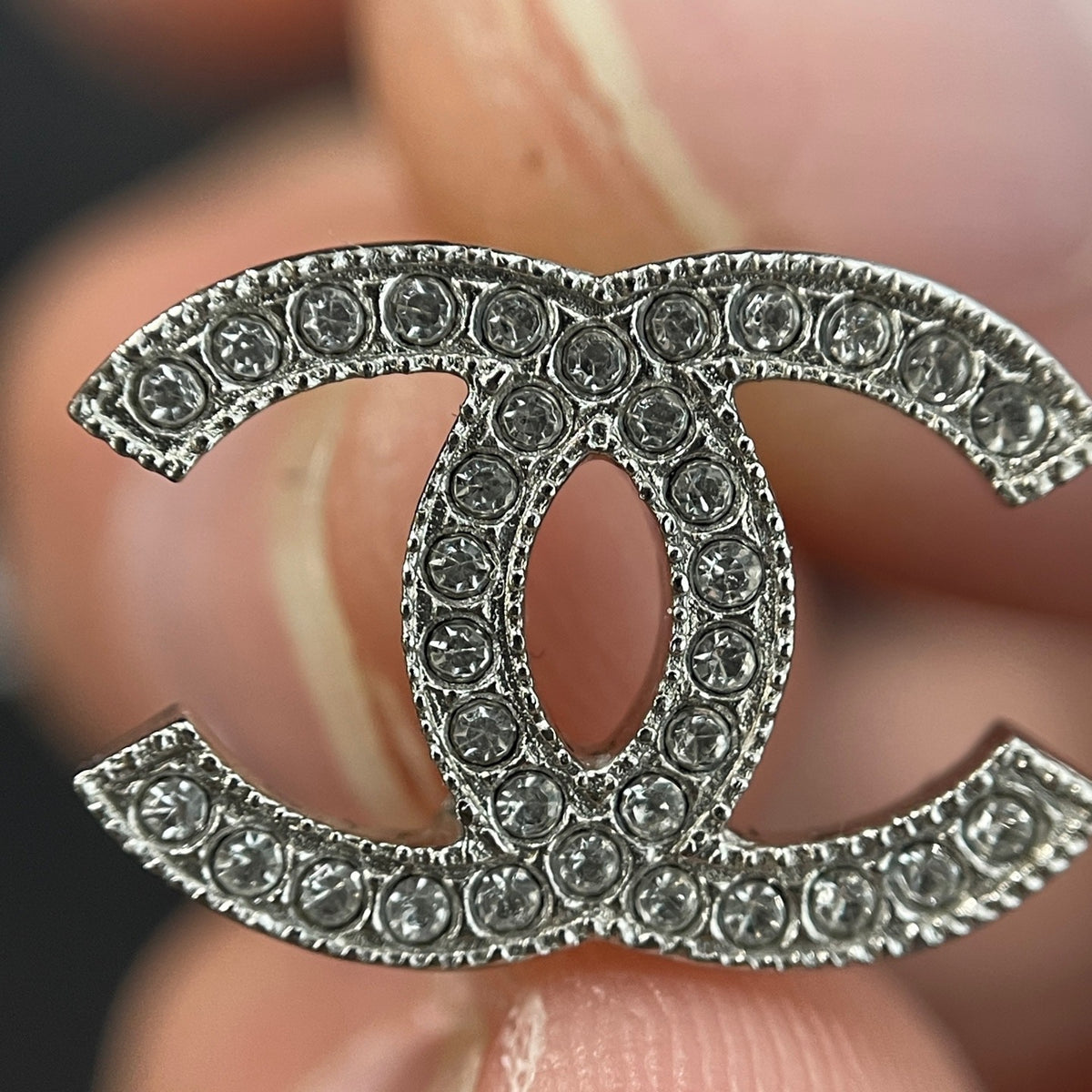 Chanel - Other - Silver-tone metal with clear rhinestone embellishments; exact alloy unspecified. - Silver