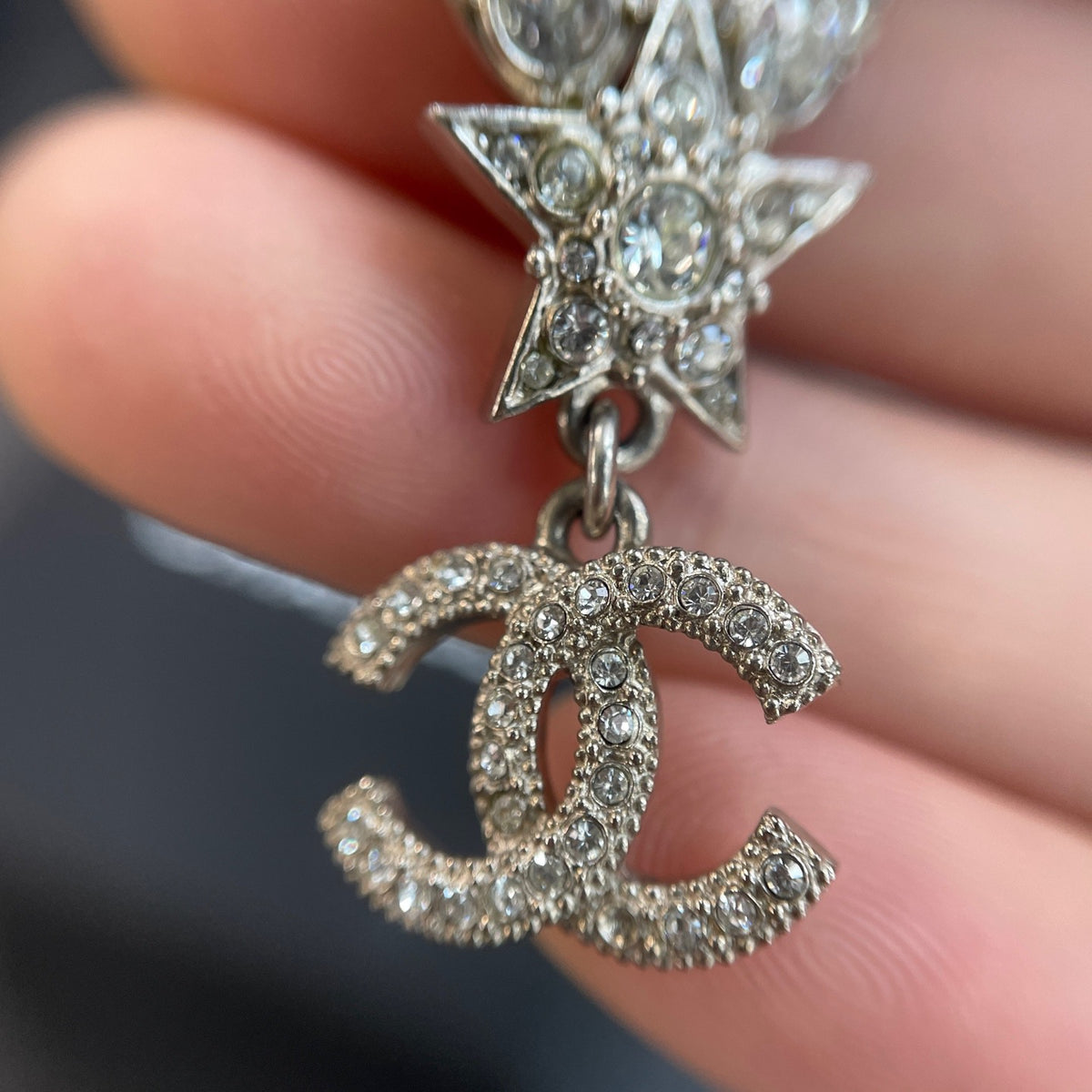 Chanel - Other - Silver-tone metal with clear rhinestone embellishments; exact composition is unconfirmed. - Silver