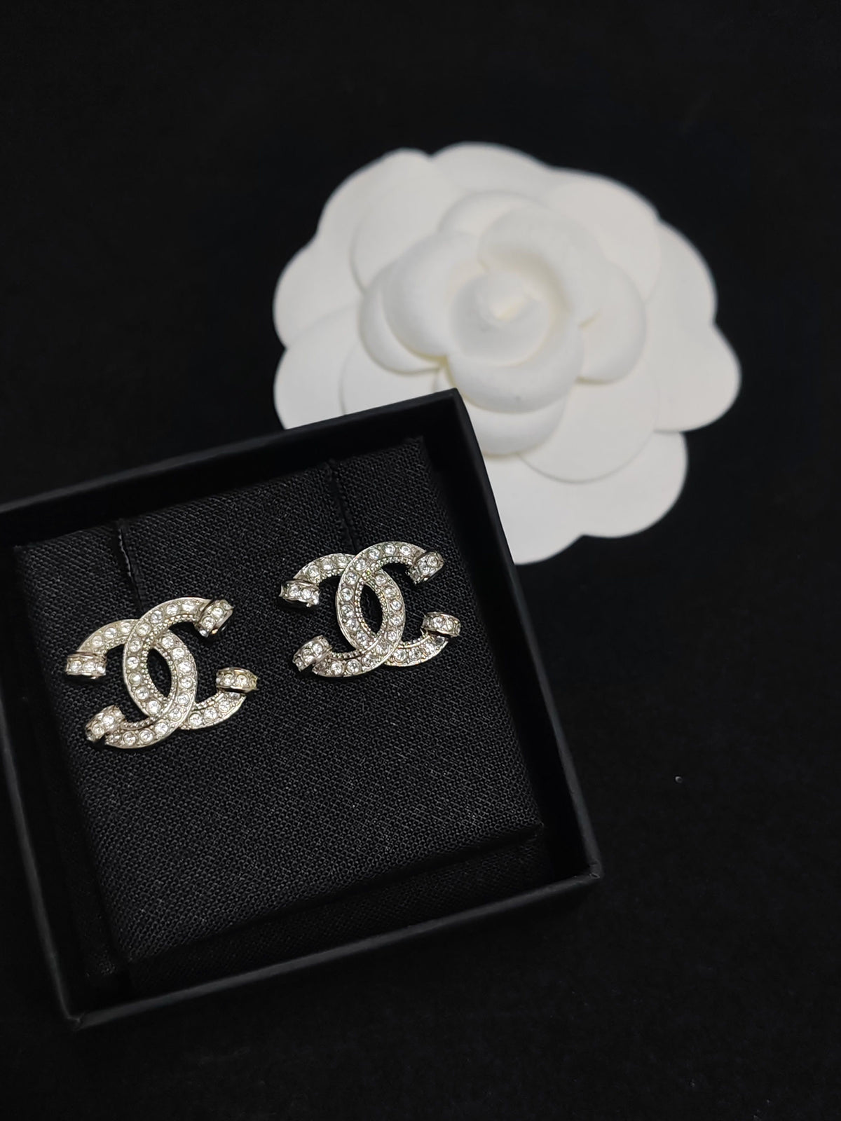 Chanel - Other - Silver-tone metal with clear rhinestone embellishments; exact metal composition is unspecified. - Silver