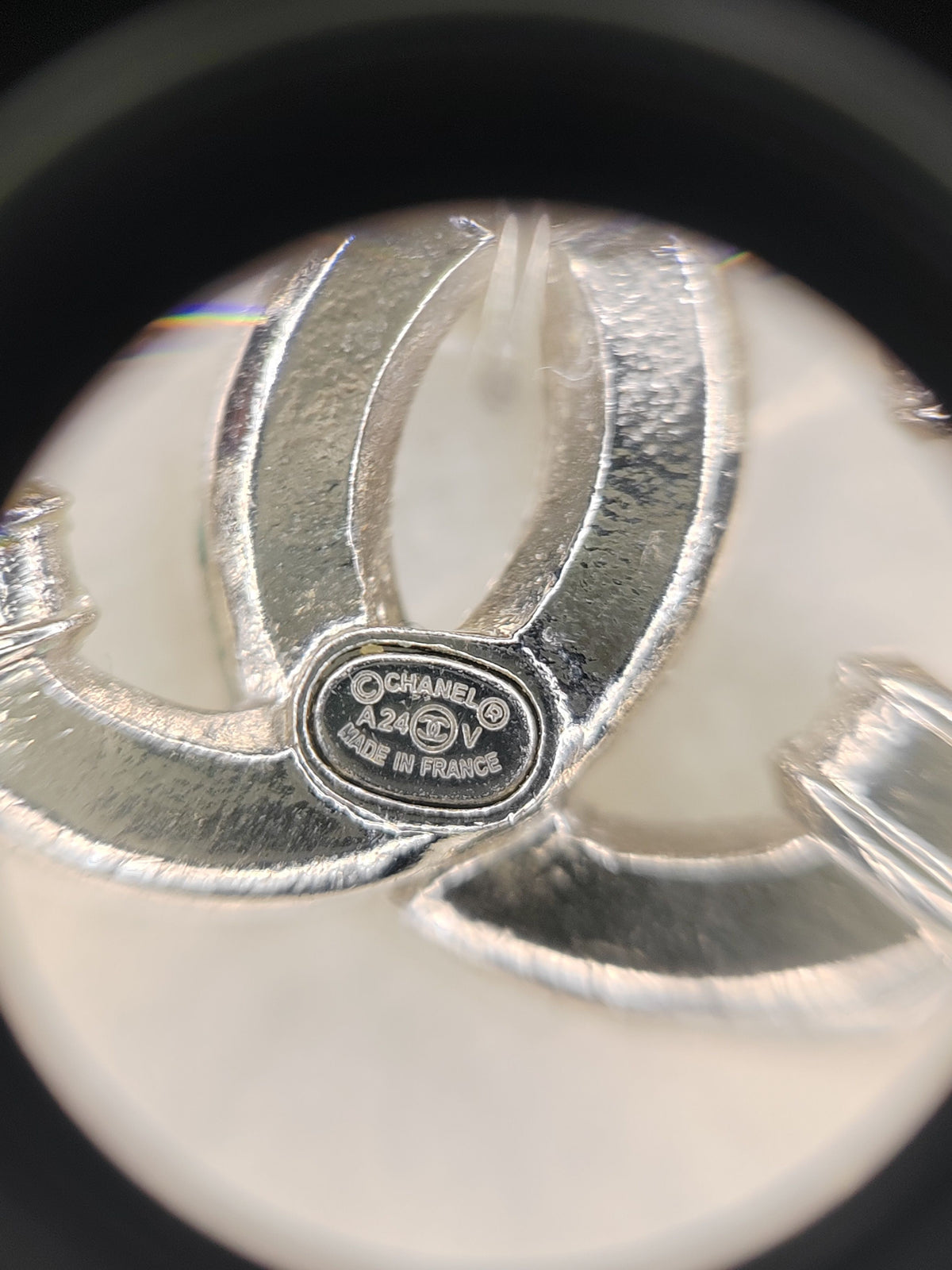 Chanel - Other - Silver-tone metal with clear rhinestone embellishments; exact metal composition is unspecified. - Silver