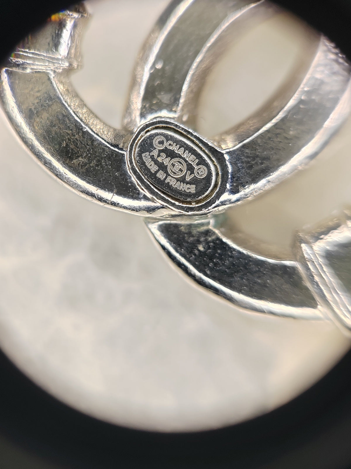 Chanel - Other - Silver-tone metal with clear rhinestone embellishments; exact metal composition is unspecified. - Silver