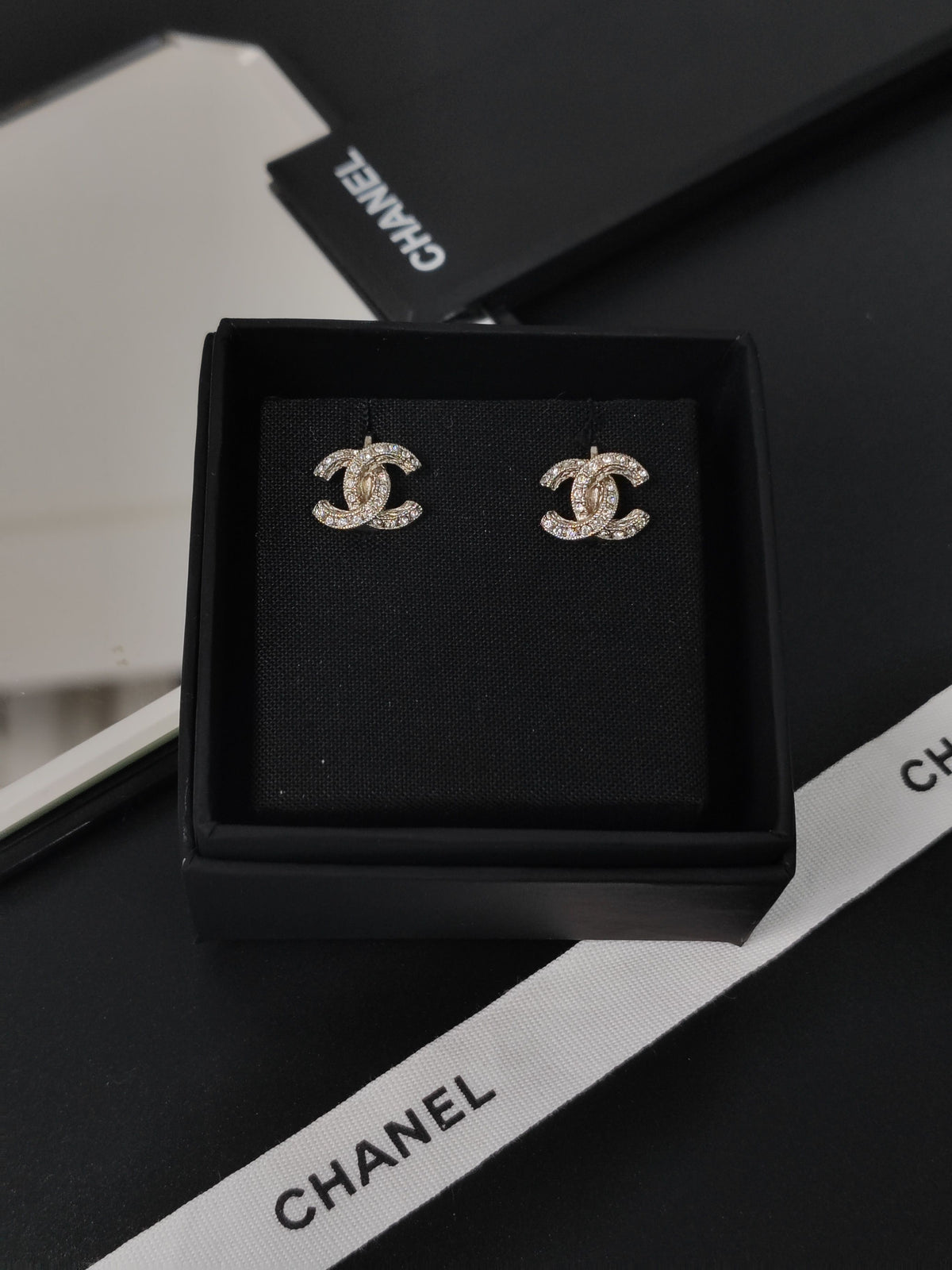 Chanel - Other - Silver-tone metal with clear rhinestone embellishments. - Silver