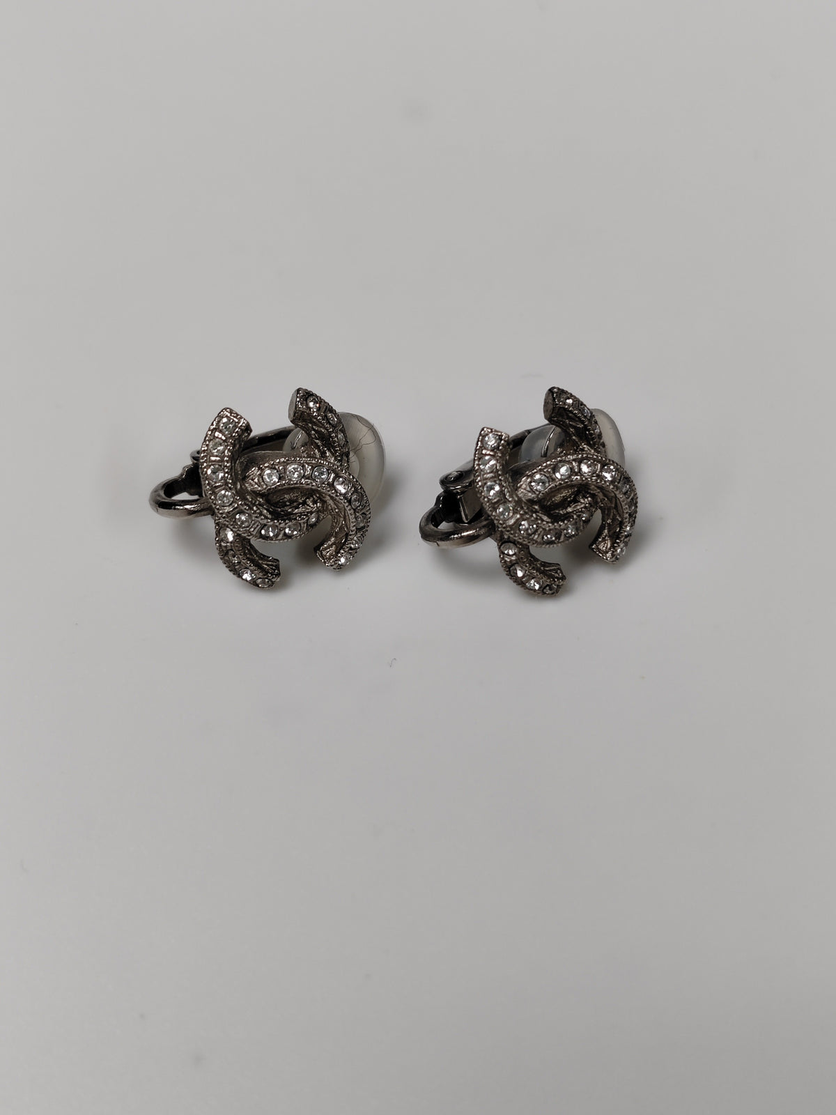 Chanel - Other - Silver-tone metal with clear rhinestone embellishments. - Silver