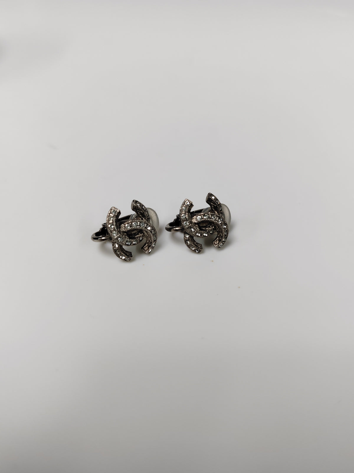 Chanel - Other - Silver-tone metal with clear rhinestone embellishments. - Silver