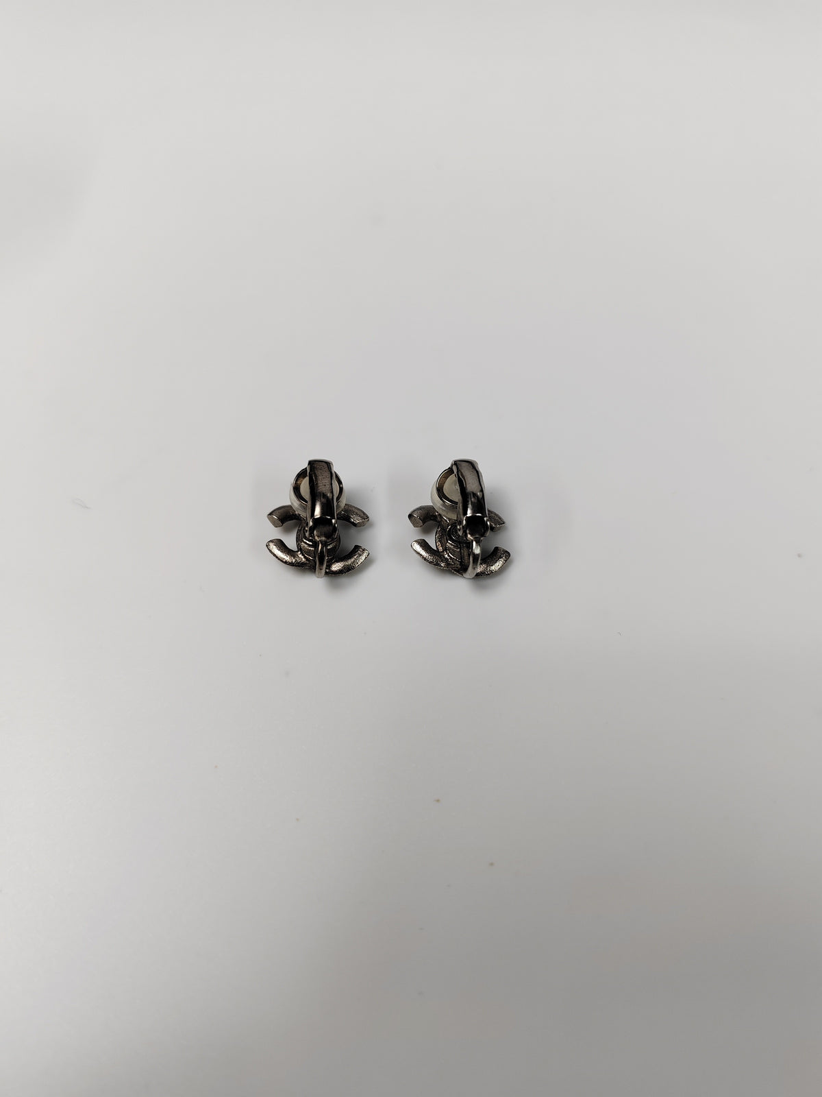 Chanel - Other - Silver-tone metal with clear rhinestone embellishments. - Silver