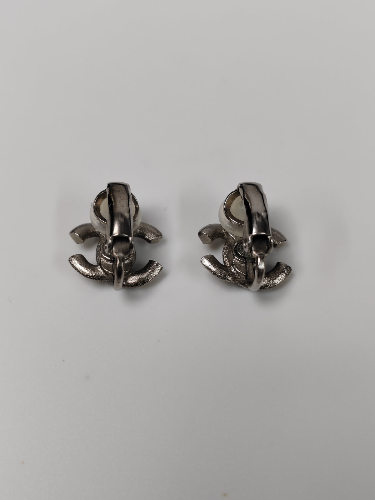 Chanel - Other - Silver-tone metal with clear rhinestone embellishments. - Silver