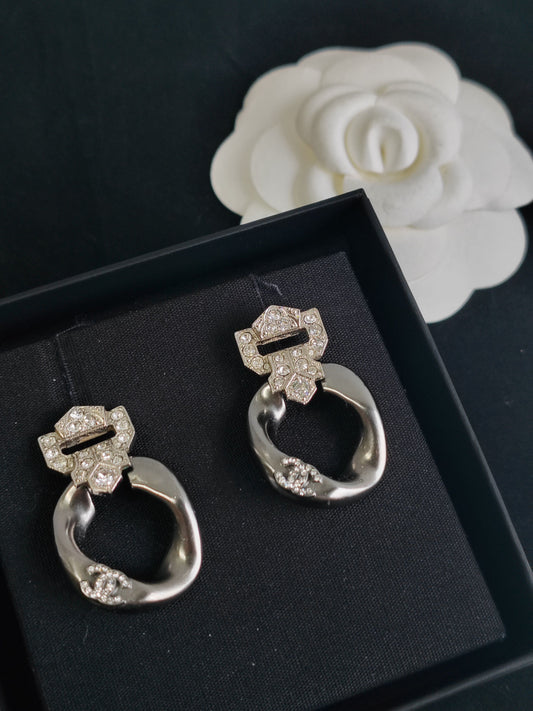 Chanel - Other - Silver-tone metal with crystal embellishments; metal composition is unspecified. - Silver