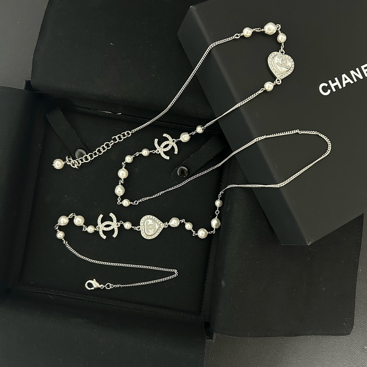 Chanel - Other - Silver-tone metal with faux pearls and crystal accents. - Silver