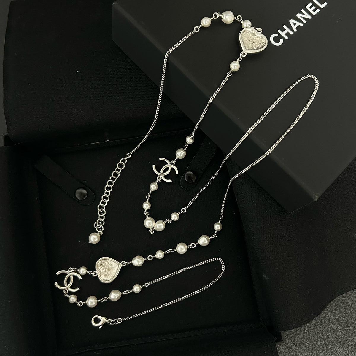 Chanel - Other - Silver-tone metal with faux pearls and crystal accents. - Silver