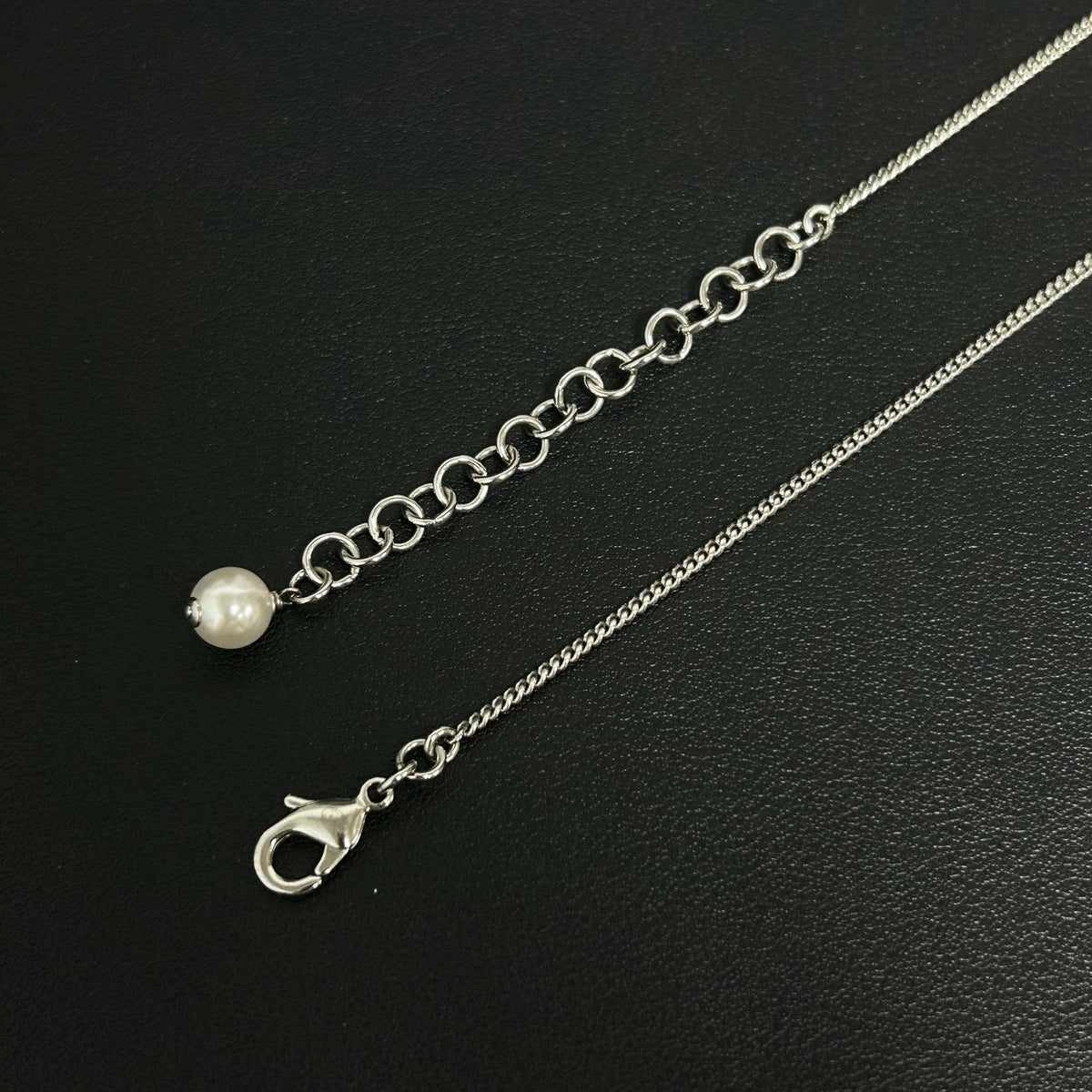 Chanel - Other - Silver-tone metal with faux pearls and crystal accents. - Silver