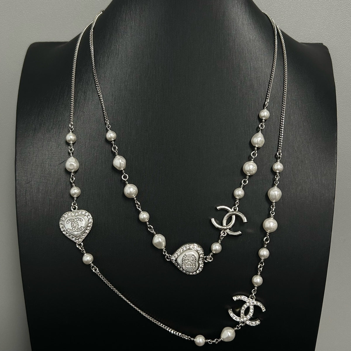 Chanel - Other - Silver-tone metal with faux pearls and crystal accents. - Silver