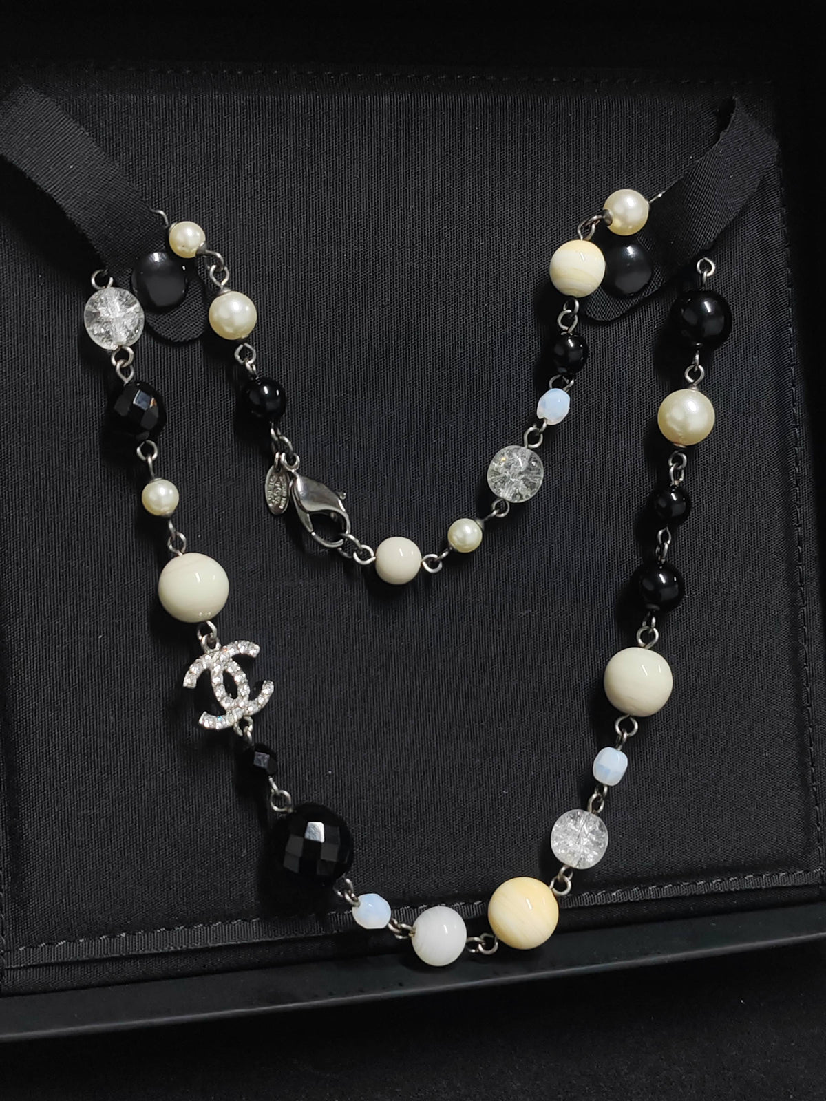 Chanel - Other - Silver-tone metal with faux pearls, decorative beads and crystal-like accents. - Multicolour