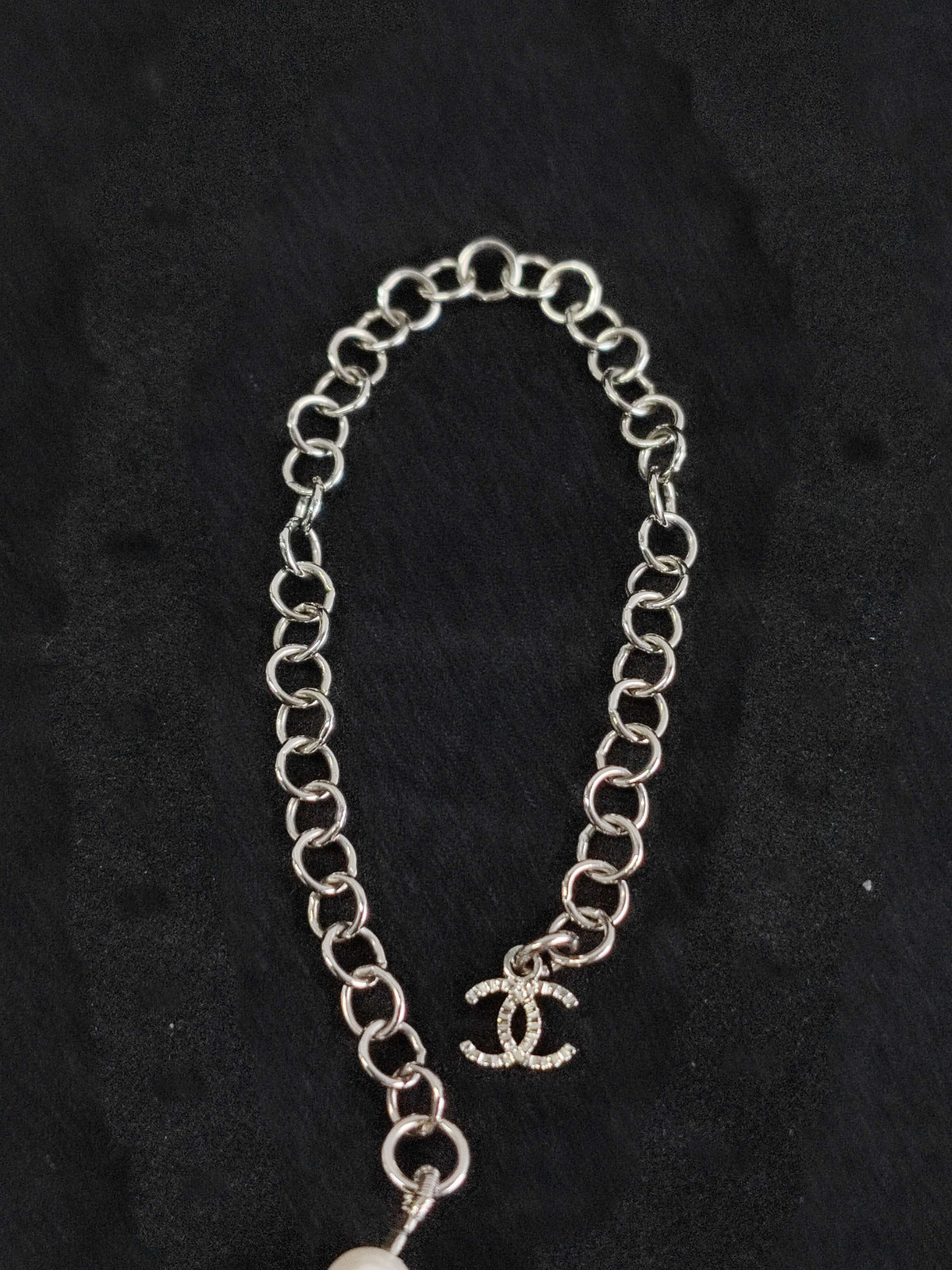 Chanel - Other - Silver-tone metal with imitation pearl beads. - White