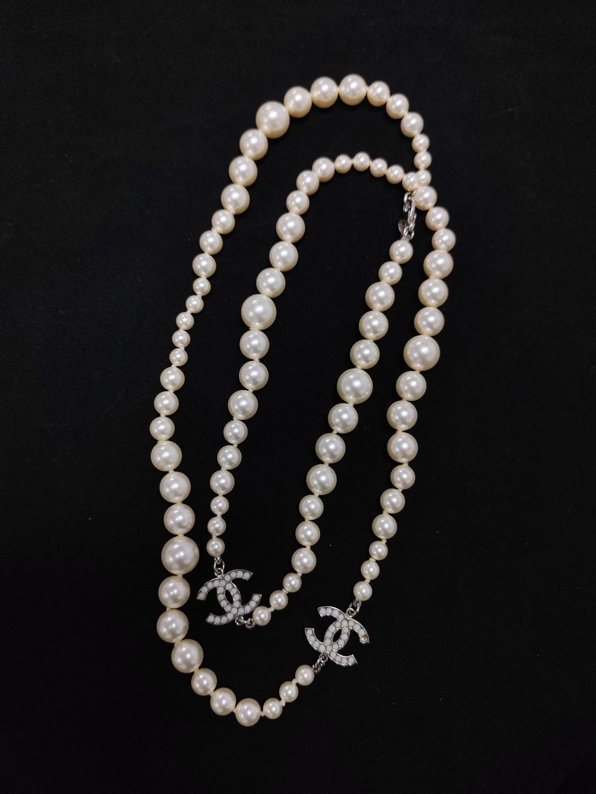 Chanel - Other - Silver-tone metal with imitation pearls and pale cabochon details; exact metal composition is unknown. - White