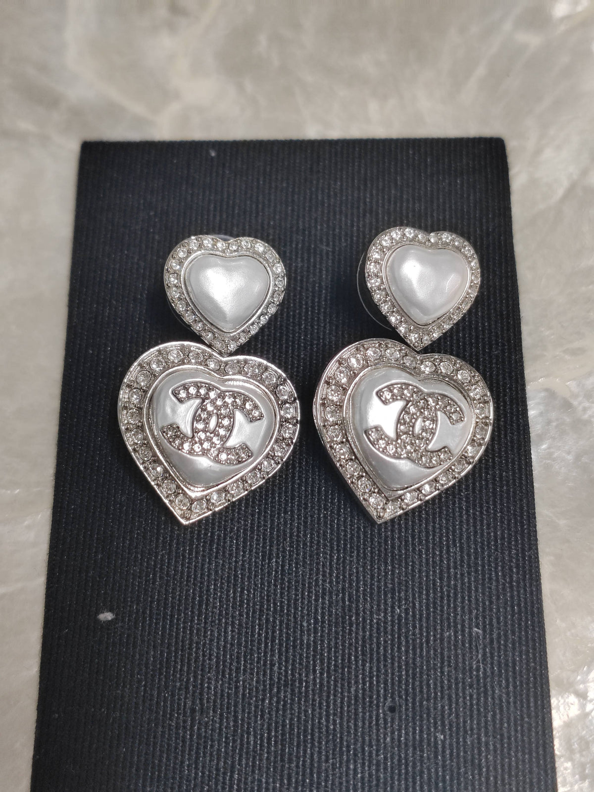 Chanel - Other - Silver-tone metal with pearl-style heart inlays and rhinestone embellishments. - Silver