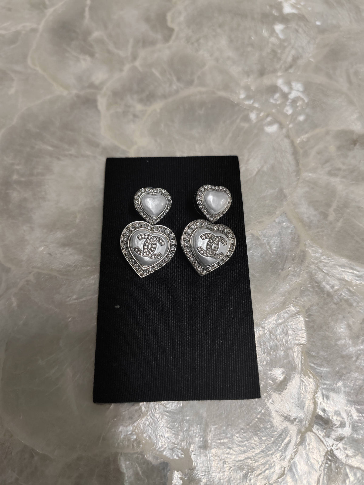 Chanel - Other - Silver-tone metal with pearl-style heart inlays and rhinestone embellishments. - Silver