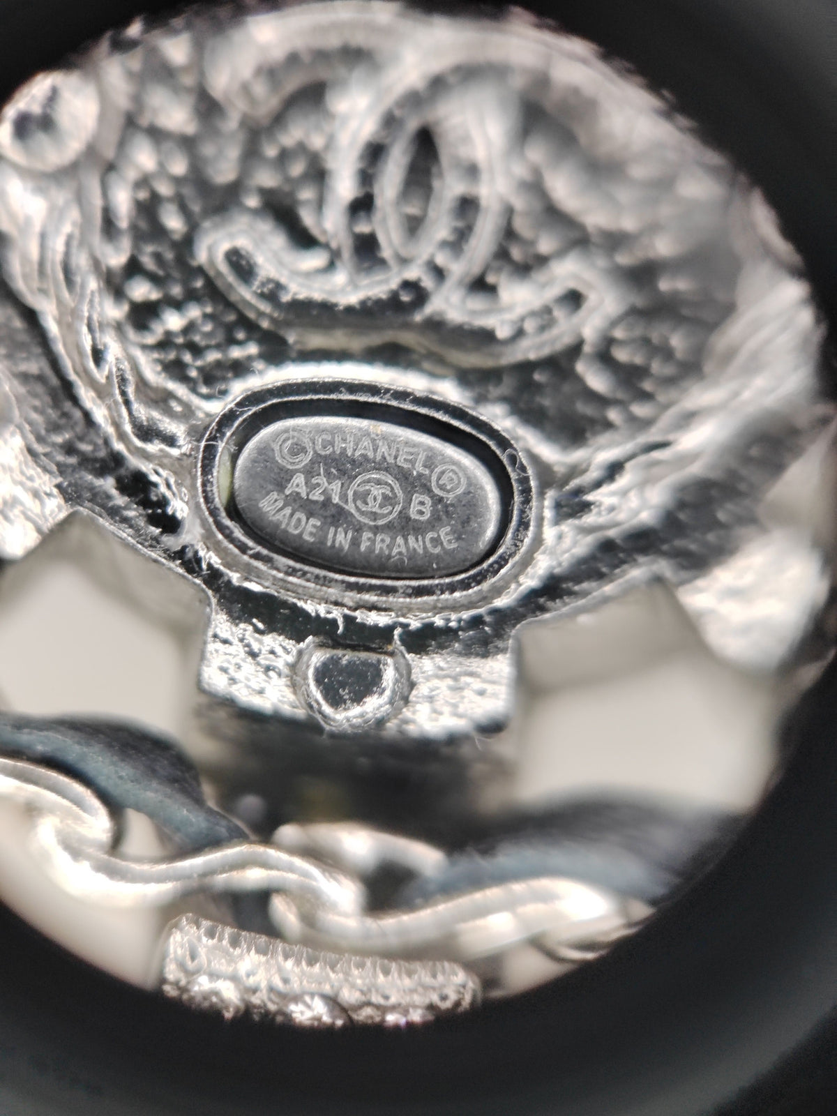 Chanel - Other - Silver-tone metal with rhinestone embellishment and a pearlescent-effect center. - Silver