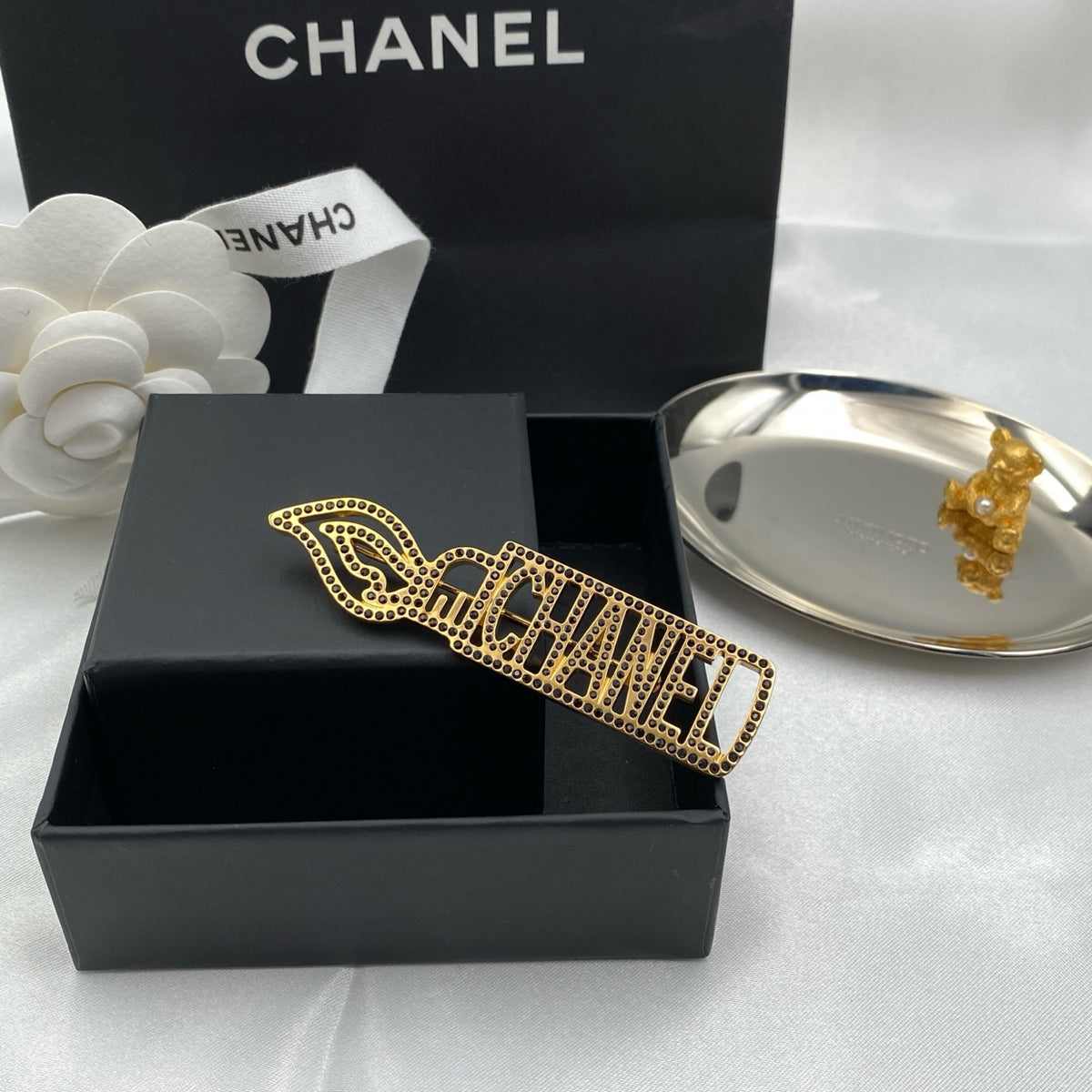 Chanel - Paris Cosmopolite - Gold-tone metal with dark crystal embellishments. - Gold