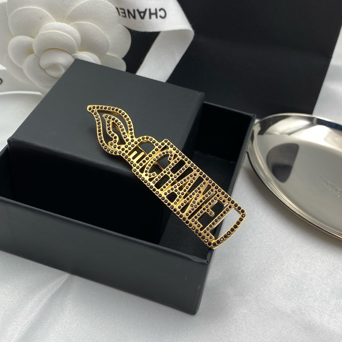 Chanel - Paris Cosmopolite - Gold-tone metal with dark crystal embellishments. - Gold