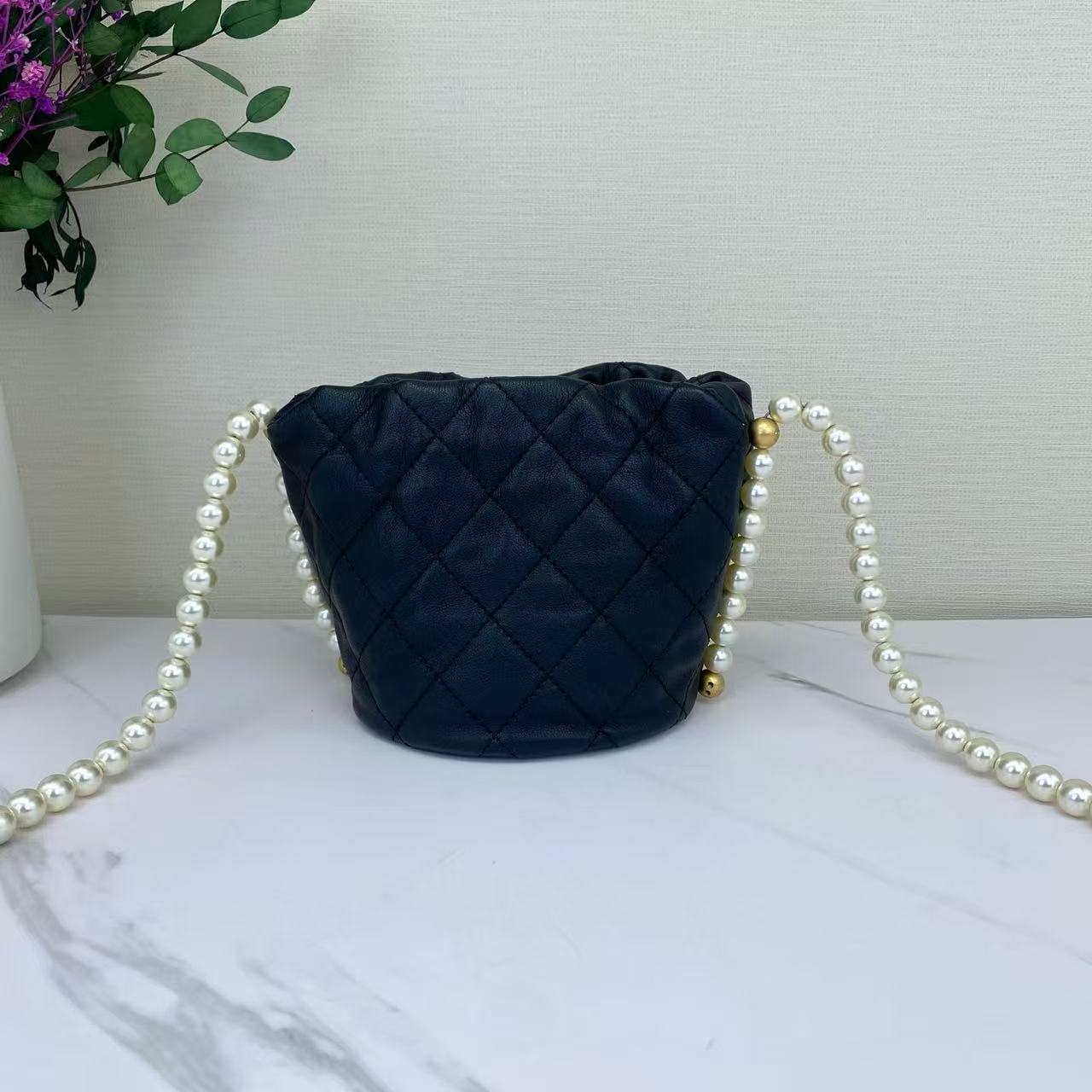 Chanel - Pearl Chain Bucket Bag - Calfskin leather - Black with Gold-Tone Hardware - (mini)