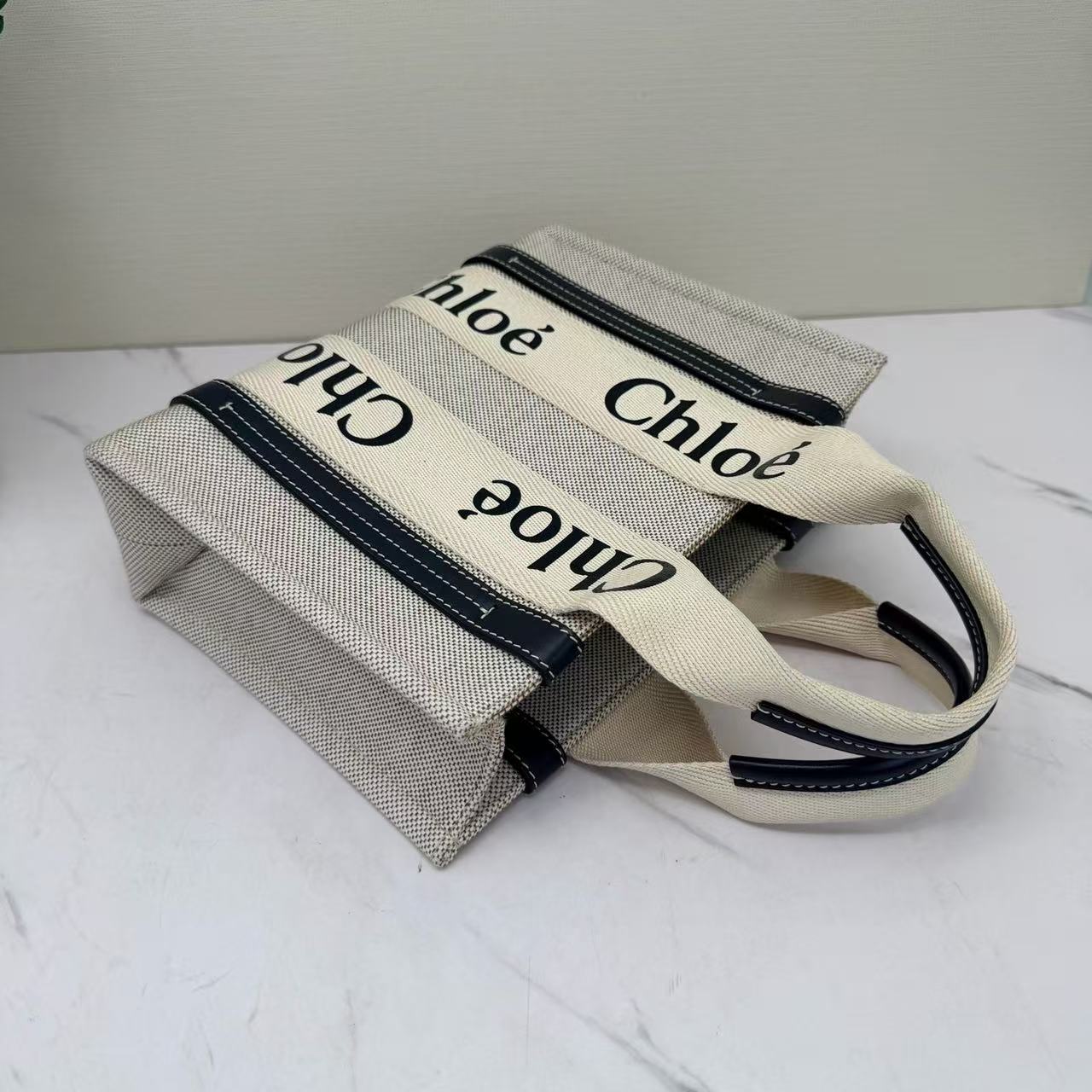 Chloe - Woody - Canvas with leather trim - Beige with dark blue accents - (Small)