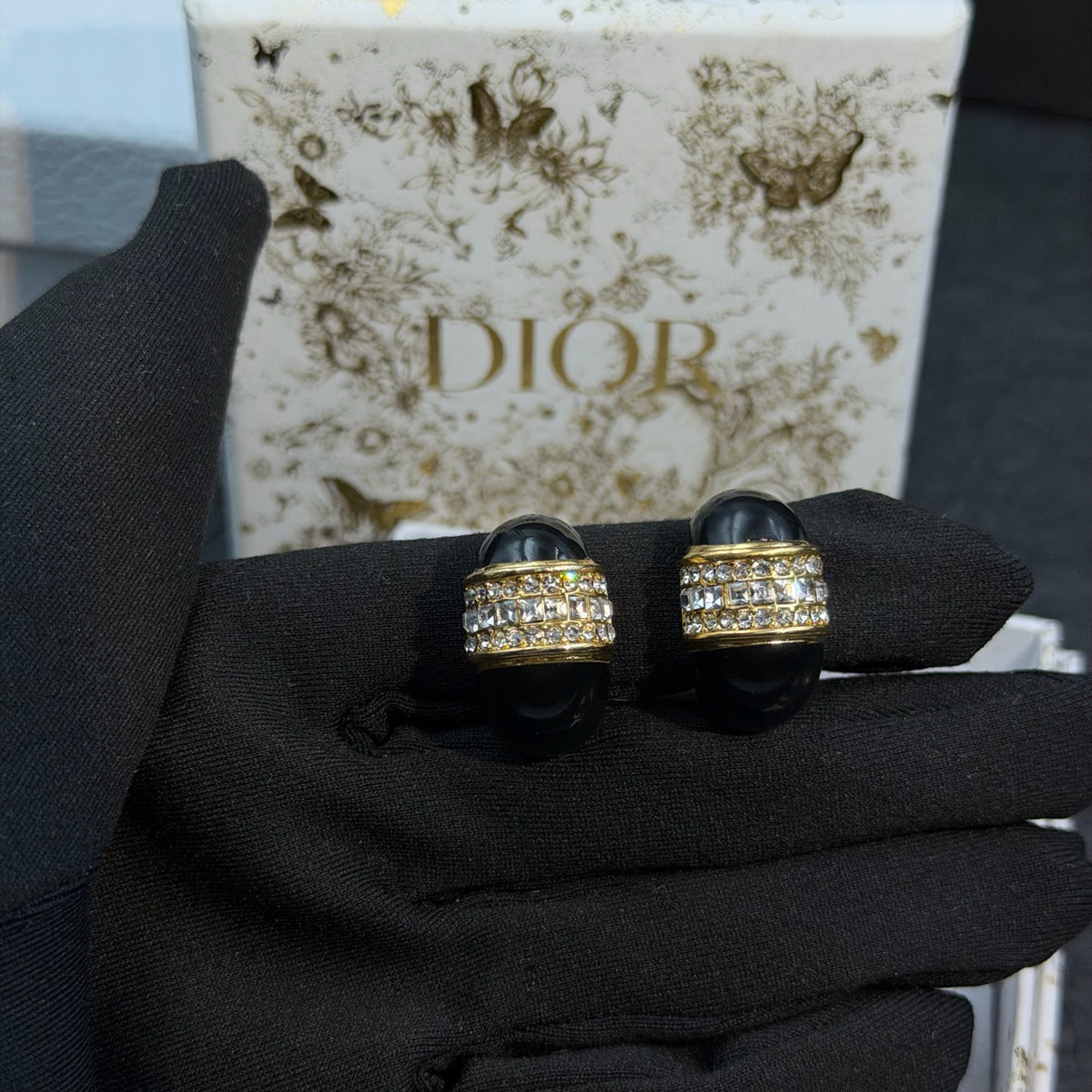 Dior - Other - Gold-tone metal with black enamel and clear rhinestone embellishments. - Black