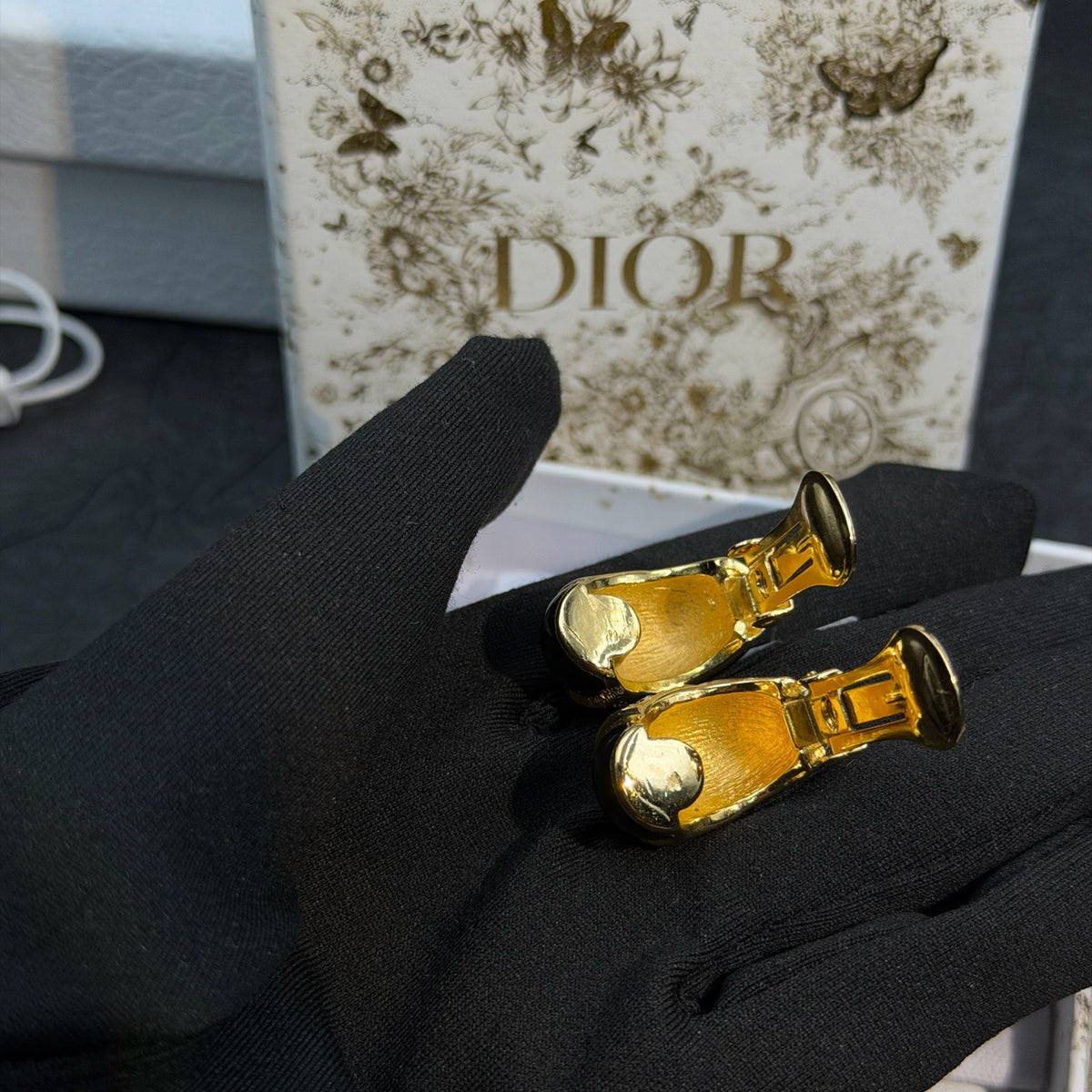 Dior - Other - Gold-tone metal with black enamel and clear rhinestone embellishments. - Black