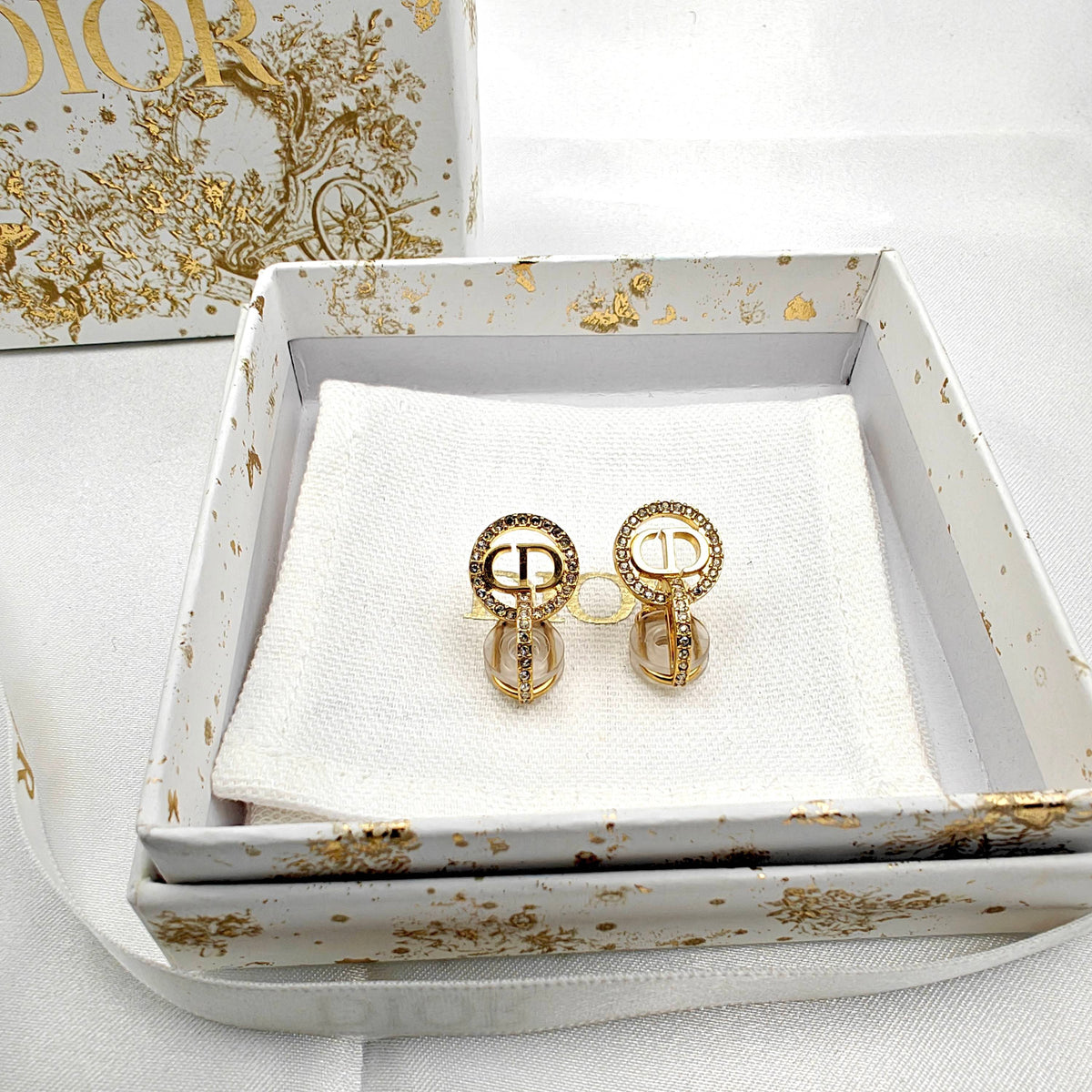 Dior - Other - Gold-tone metal with clear rhinestone embellishments. - Gold