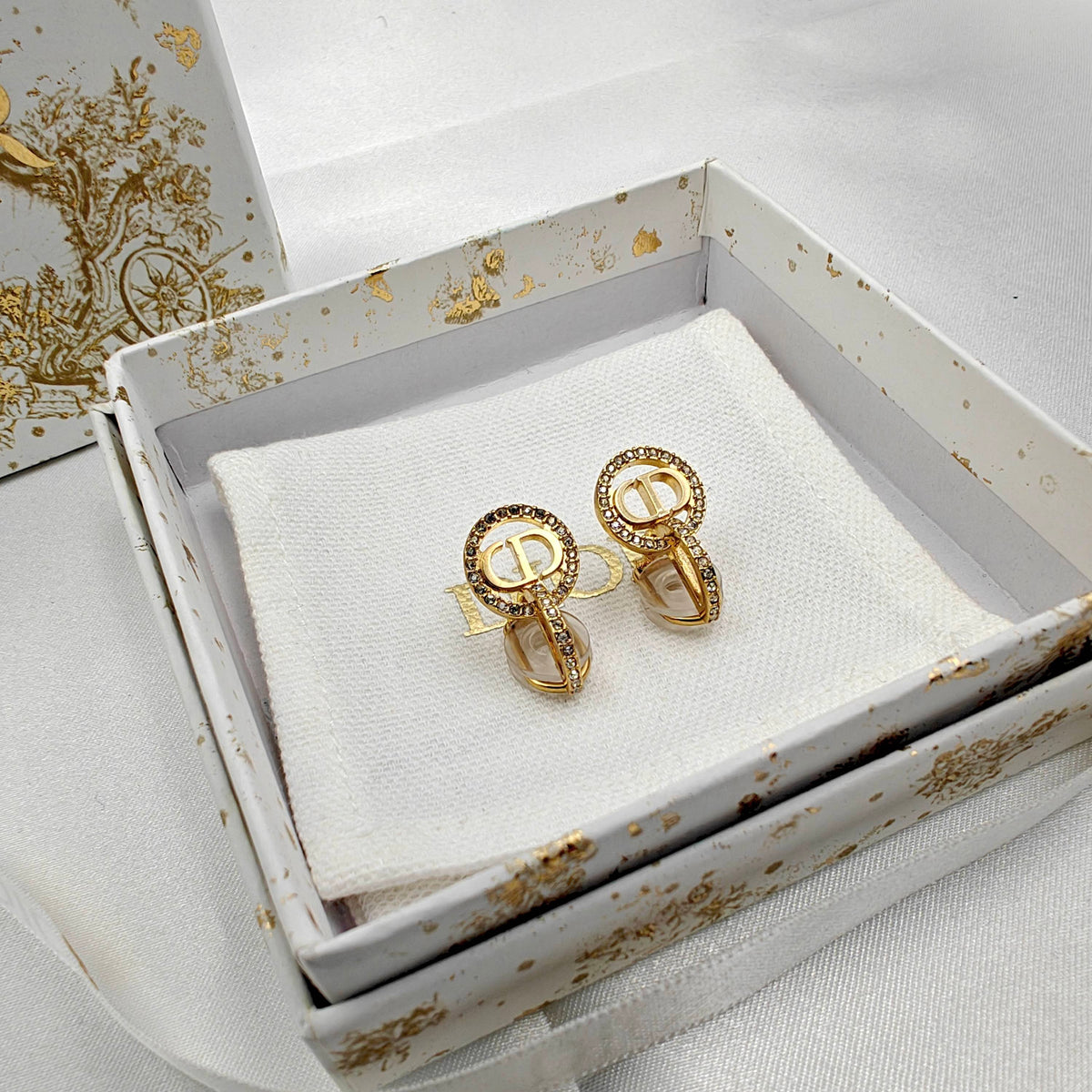 Dior - Other - Gold-tone metal with clear rhinestone embellishments. - Gold