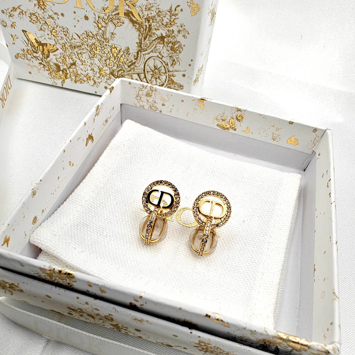 Dior - Other - Gold-tone metal with clear rhinestone embellishments. - Gold