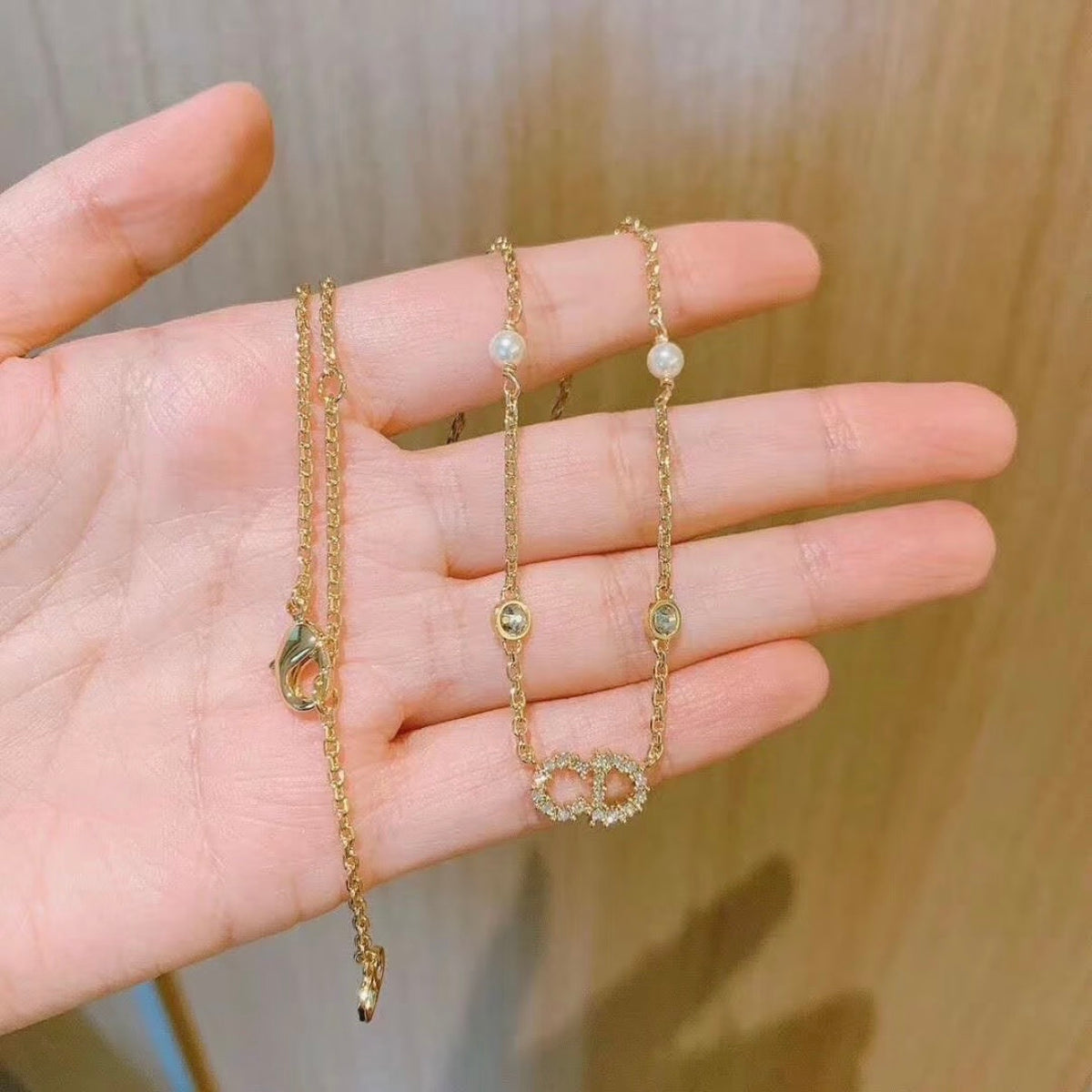 Dior - Other - Gold-tone metal with crystal accents and pearl details - Gold