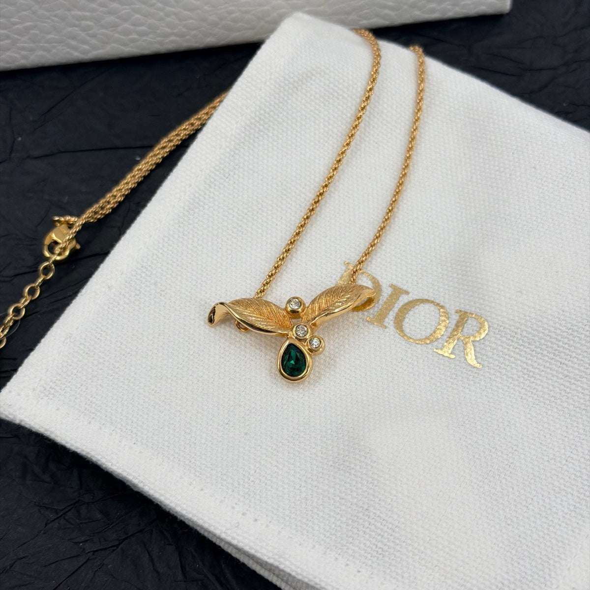 Dior - Other - Gold-tone metal with green and clear rhinestone embellishments. - Green