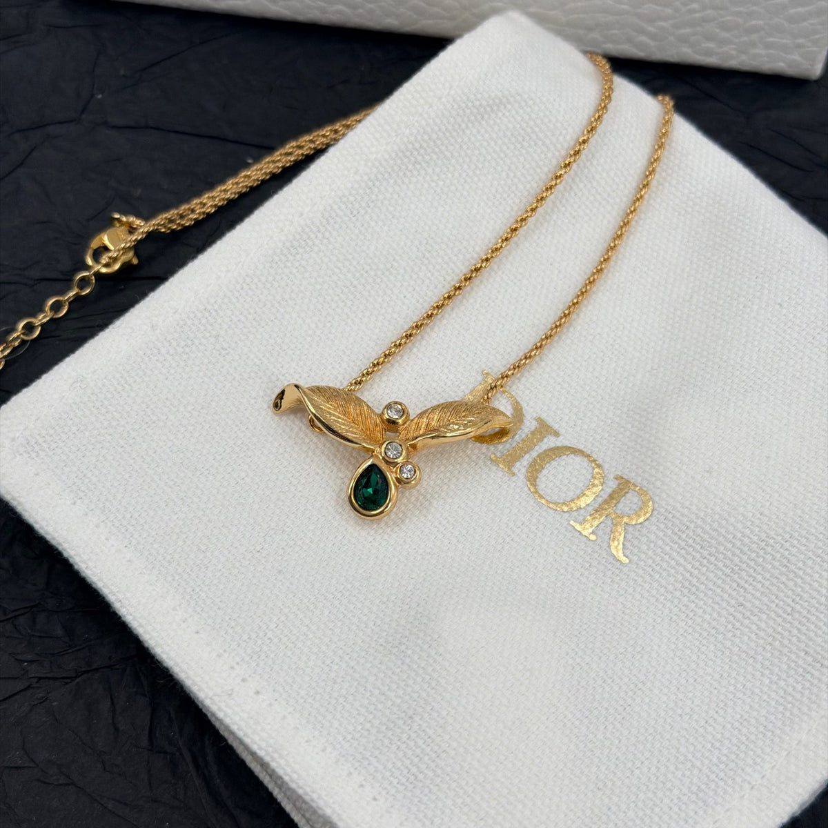 Dior - Other - Gold-tone metal with green and clear rhinestone embellishments. - Green