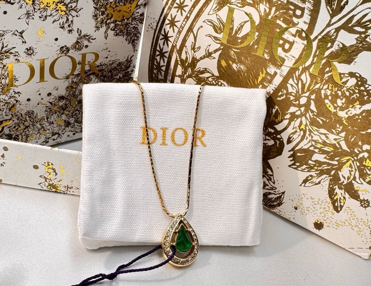 Dior - Other - Gold-tone metal with green and clear stones; stone composition unconfirmed. - Multicolour
