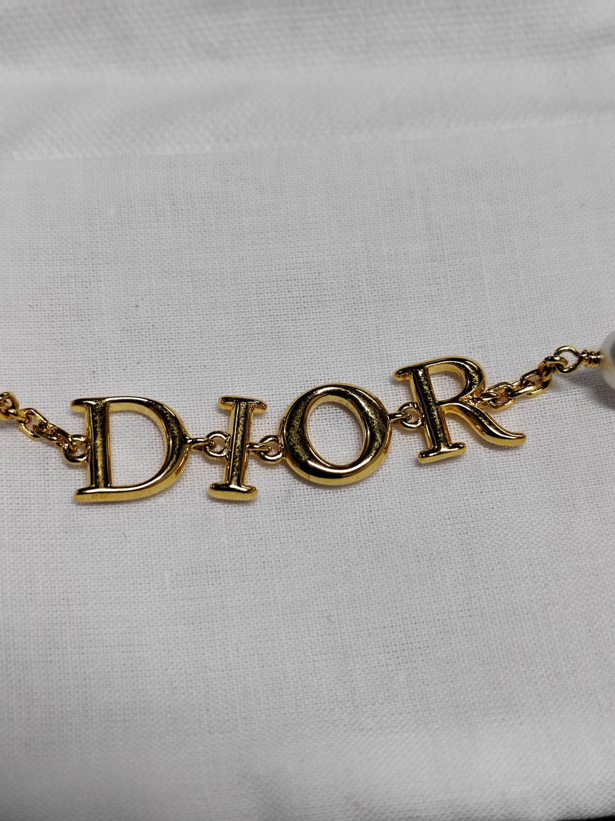 Dior - Other - Gold-tone metal with pearl-effect beads; bead composition unconfirmed. - Gold