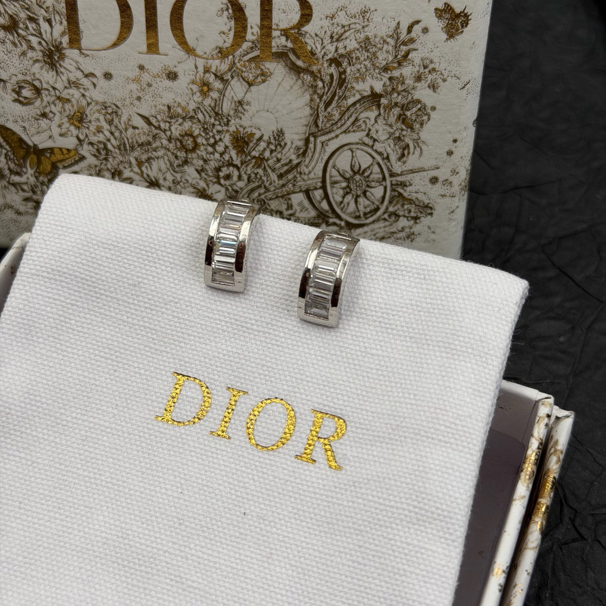Dior - Other - Silver-tone metal with clear rhinestone embellishments; base metal composition unspecified. - Silver