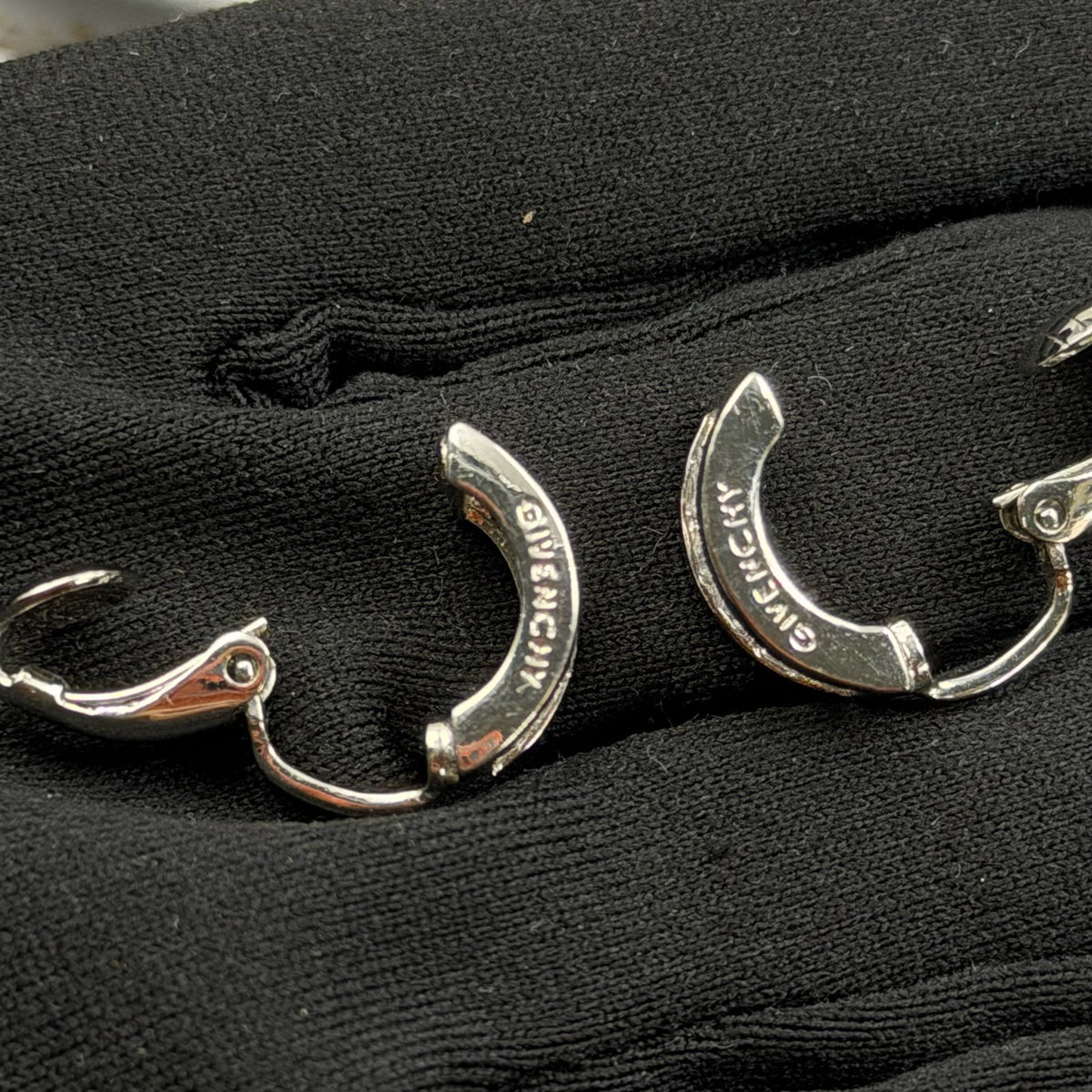 Dior - Other - Silver-tone metal with clear rhinestone embellishments; base metal composition unspecified. - Silver