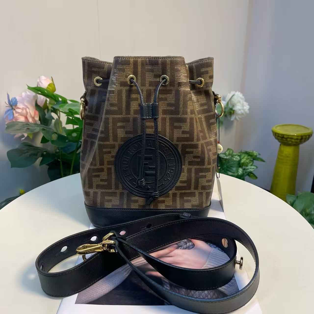Fendi - Mon Tresor Bucket Bag - Coated canvas with leather trim - Brown with black accents and gold-tone hardware - (small)