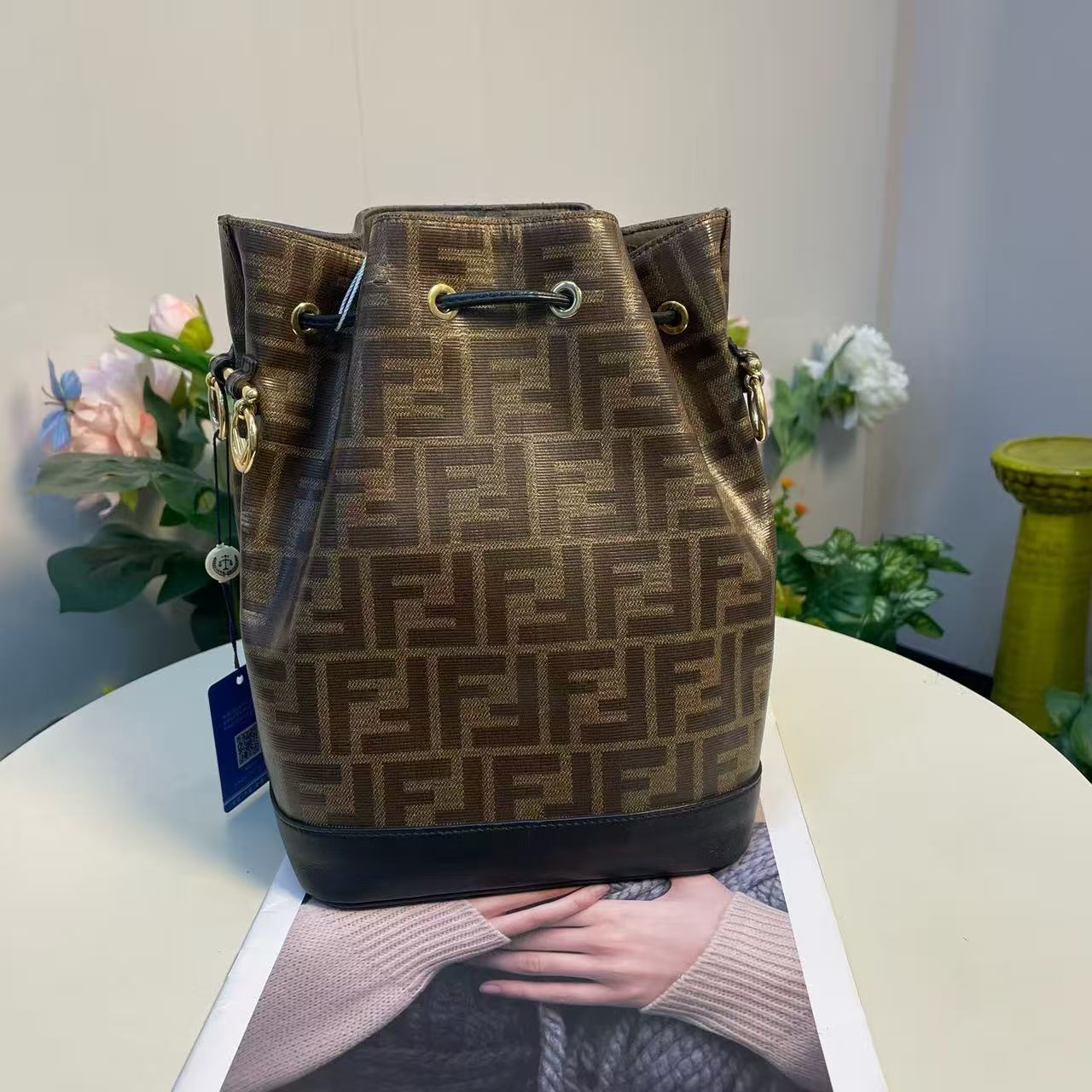 Fendi - Mon Tresor Bucket Bag - Coated canvas with leather trim - Brown with black accents and gold-tone hardware - (small)