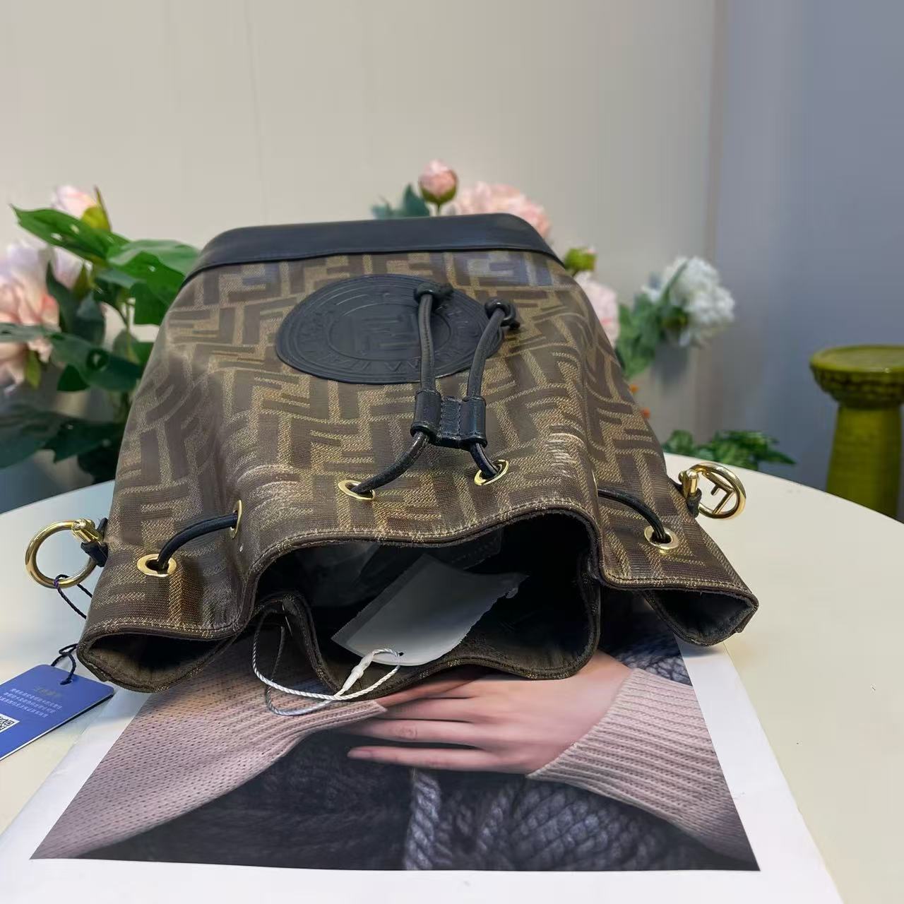 Fendi - Mon Tresor Bucket Bag - Coated canvas with leather trim - Brown with black accents and gold-tone hardware - (small)