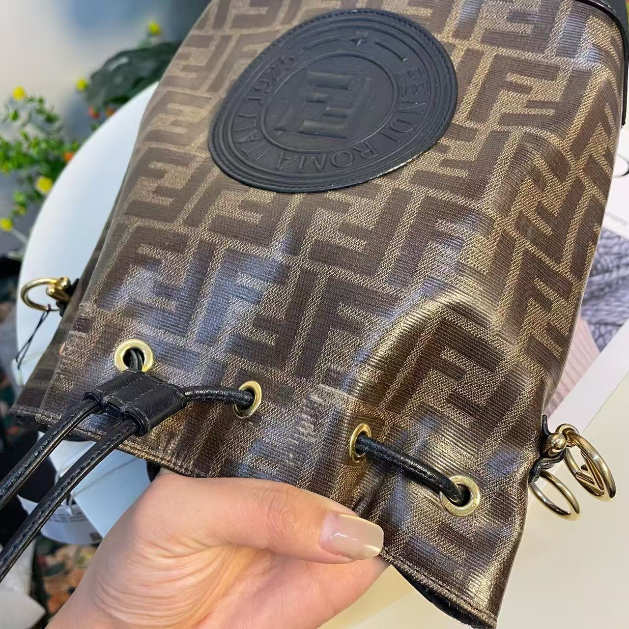 Fendi - Mon Tresor Bucket Bag - Coated canvas with leather trim - Brown with black accents and gold-tone hardware - (small)