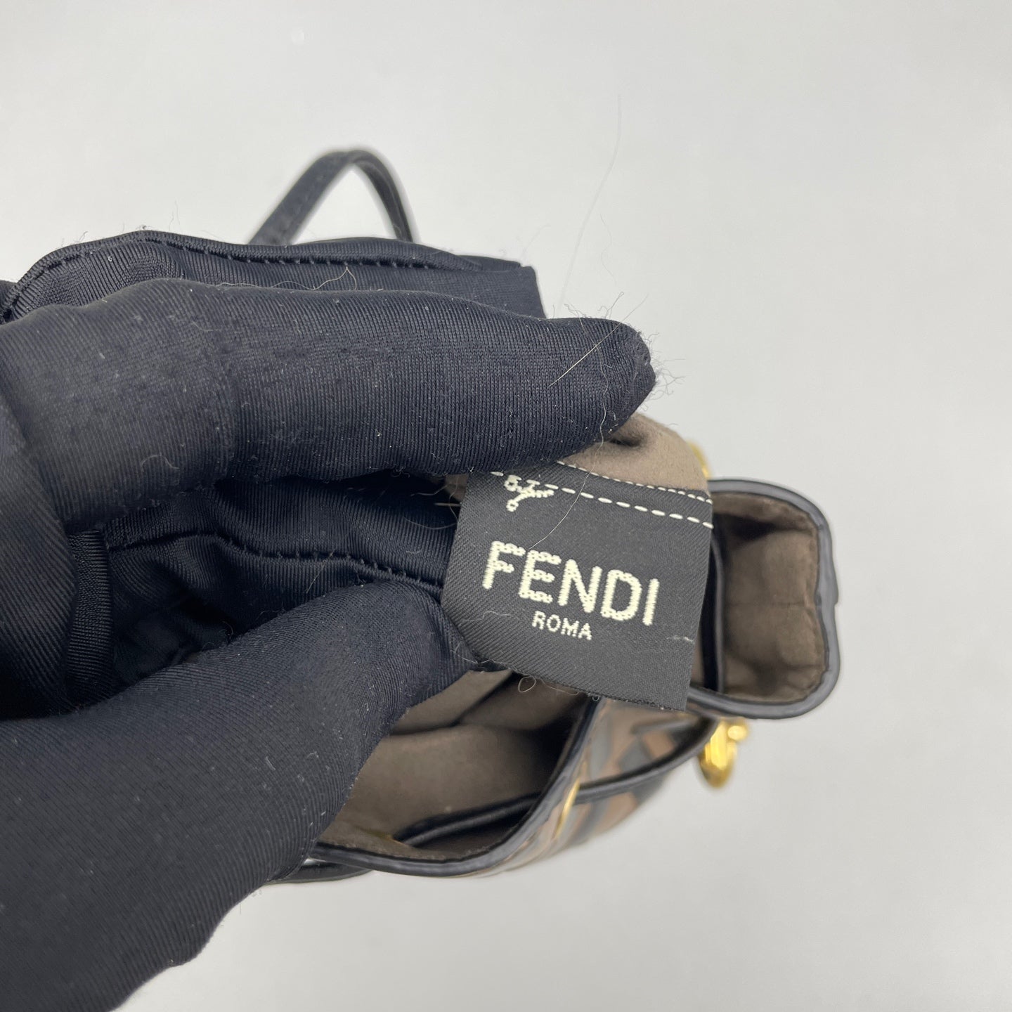 Fendi - Mon Tresor Mini Bucket Bag - Coated canvas with leather trim - Brown and Black - (mini)