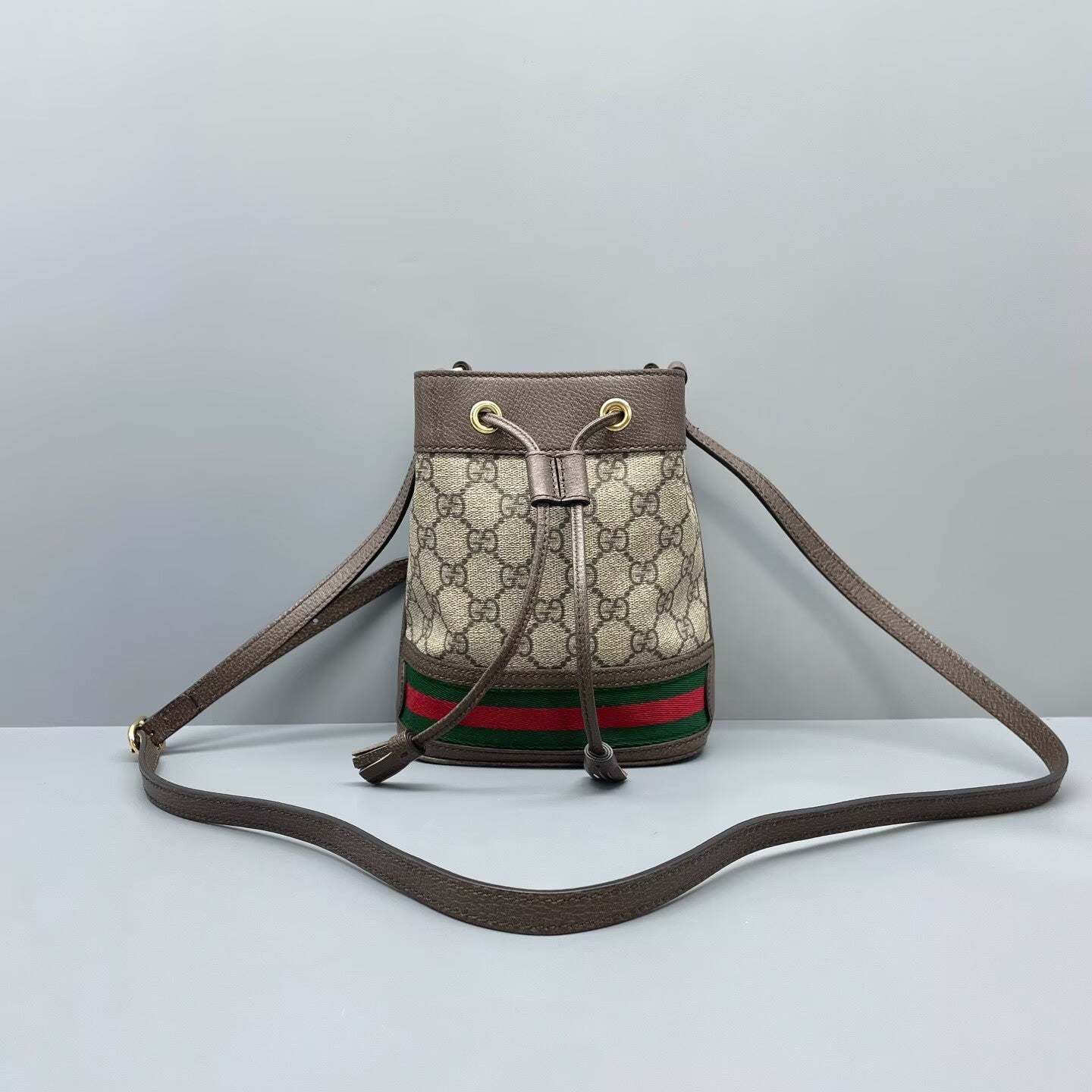 Gucci - Bucket bag - GG Supreme canvas with leather trim - Ebony (Brown) with red and green Web stripe - (mini)