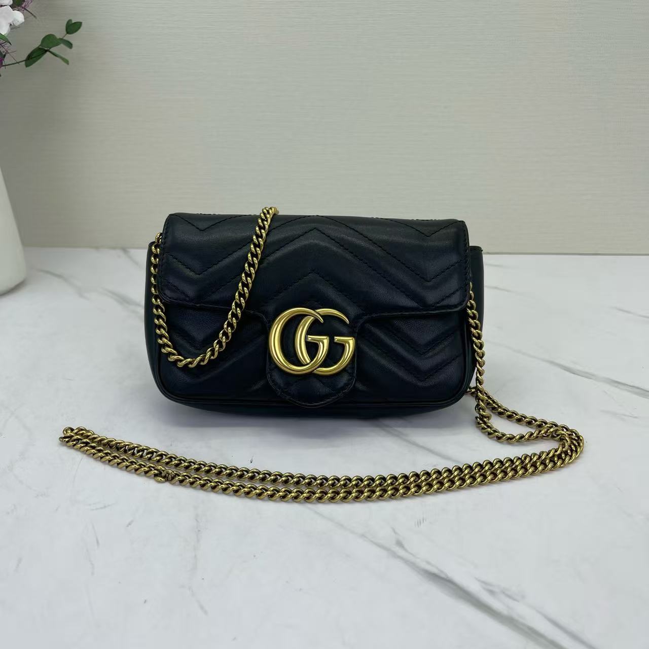 Gucci - GG Marmont Super Mini Shoulder Bag - Matelassé leather - Black with Gold-Tone Hardware - (mini)