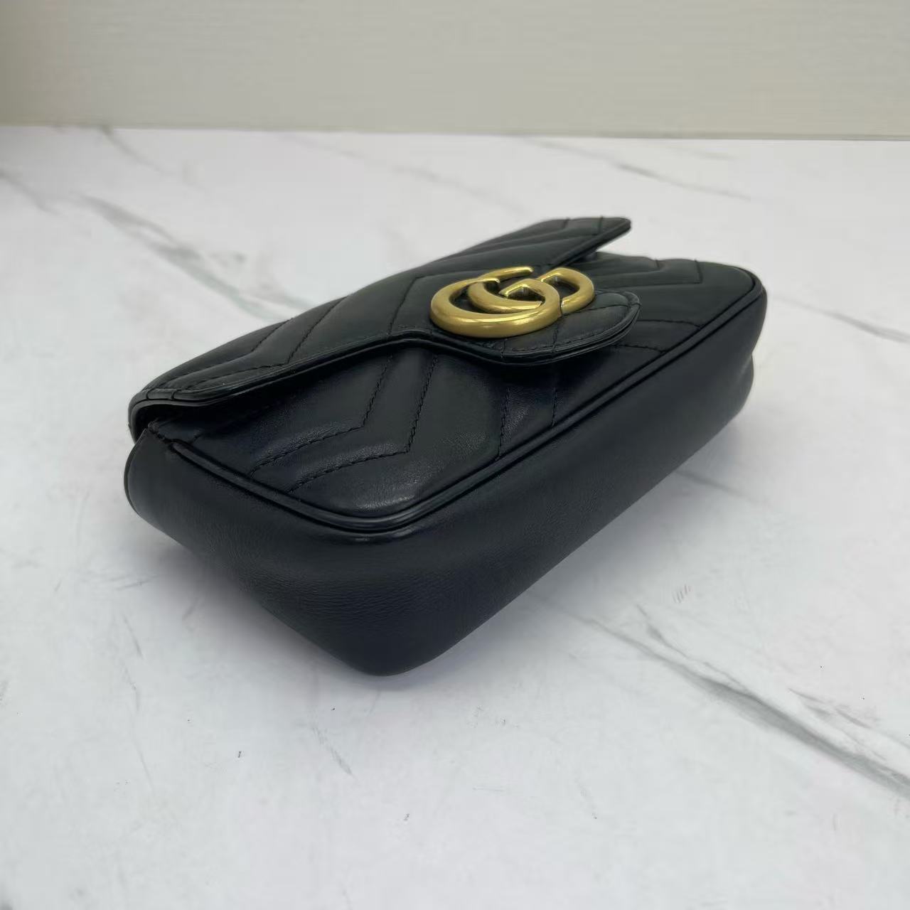 Gucci - GG Marmont Super Mini Shoulder Bag - Matelassé leather - Black with Gold-Tone Hardware - (mini)